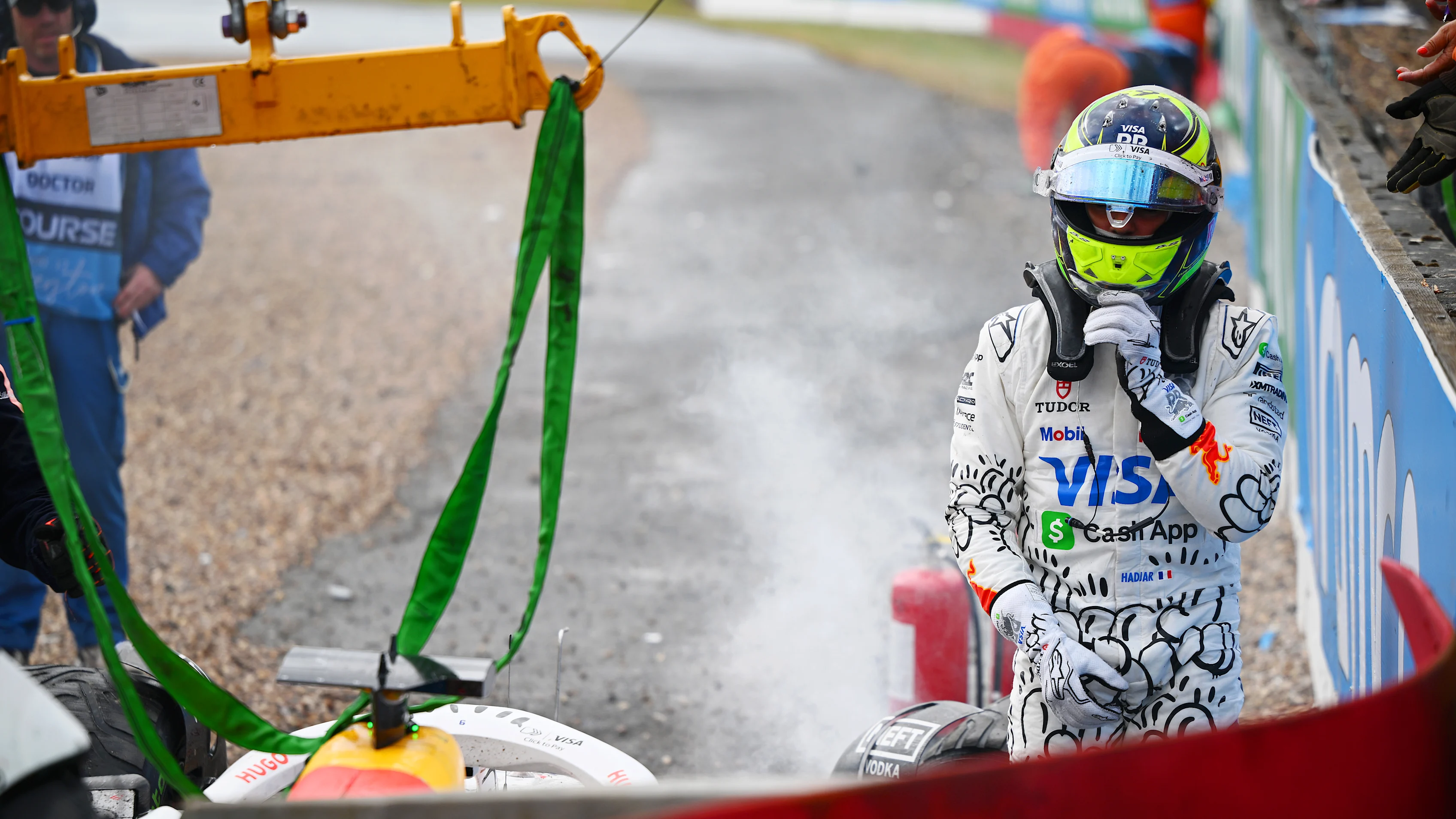 NORTHAMPTON, ENGLAND - JULY 06: Isack Hadjar of France and Visa Cash App Racing Bulls retires in