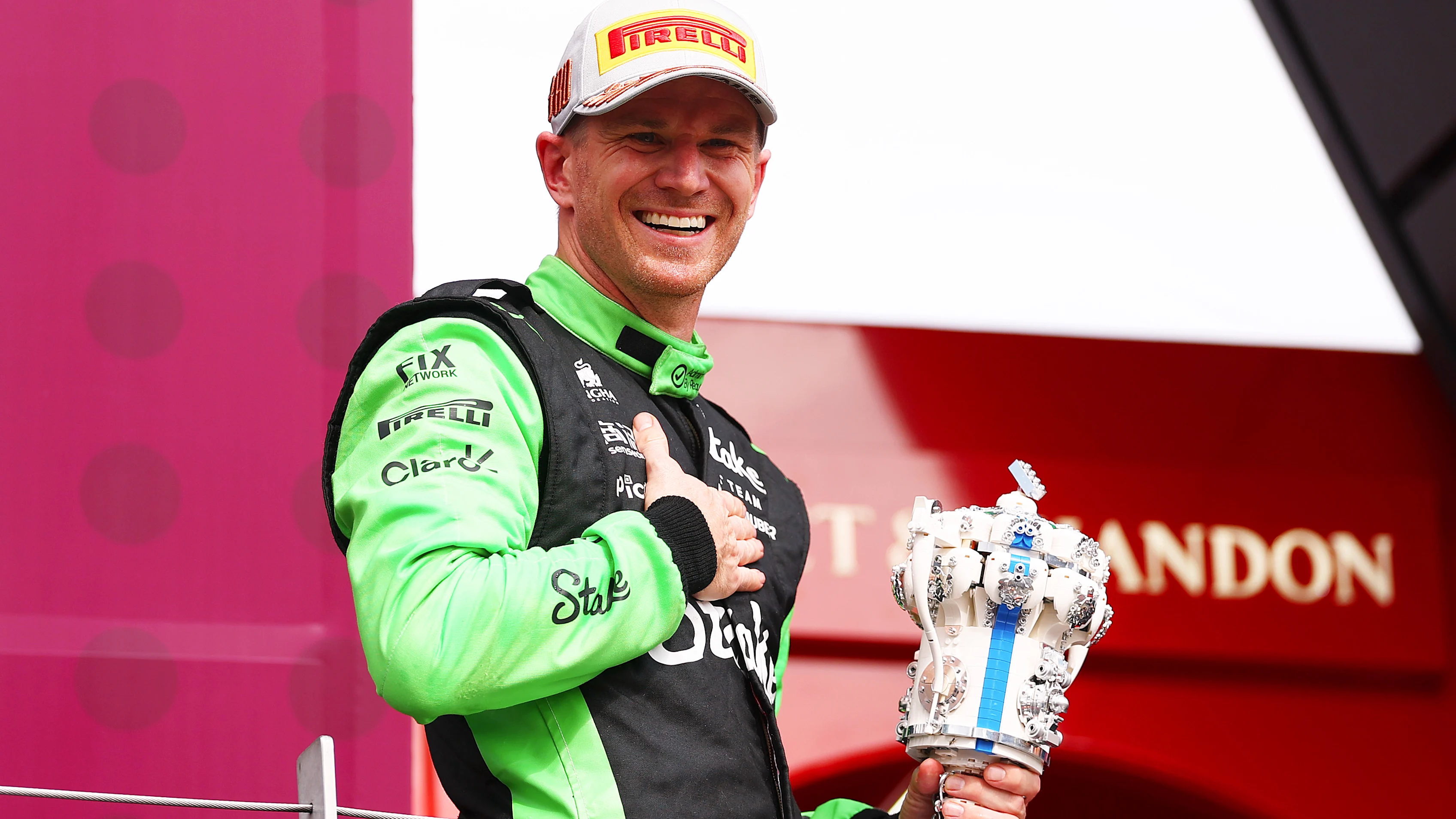 NORTHAMPTON, ENGLAND - JULY 06: Third placed Nico Hulkenberg of Germany and Stake F1 Team Kick Sauber celebrates on the podium during the F1 Grand Prix of Great Britain at Silverstone Circuit on July 06, 2025 in Northampton, England. (Photo by Bryn Lennon - Formula 1/Formula 1 via Getty Images)