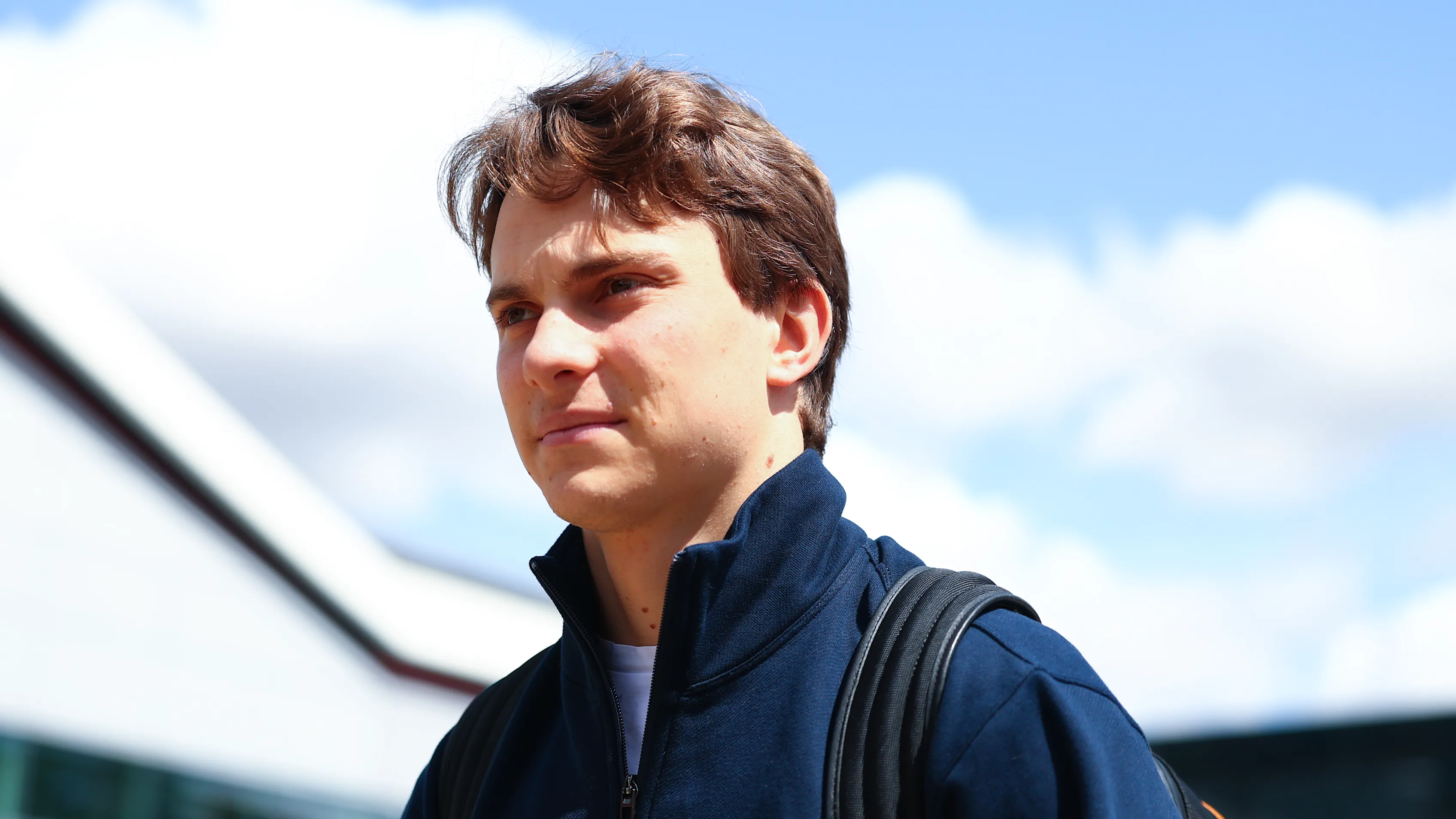 NORTHAMPTON, ENGLAND - JULY 03: Oscar Piastri of Australia and McLaren looks on in the Paddock
