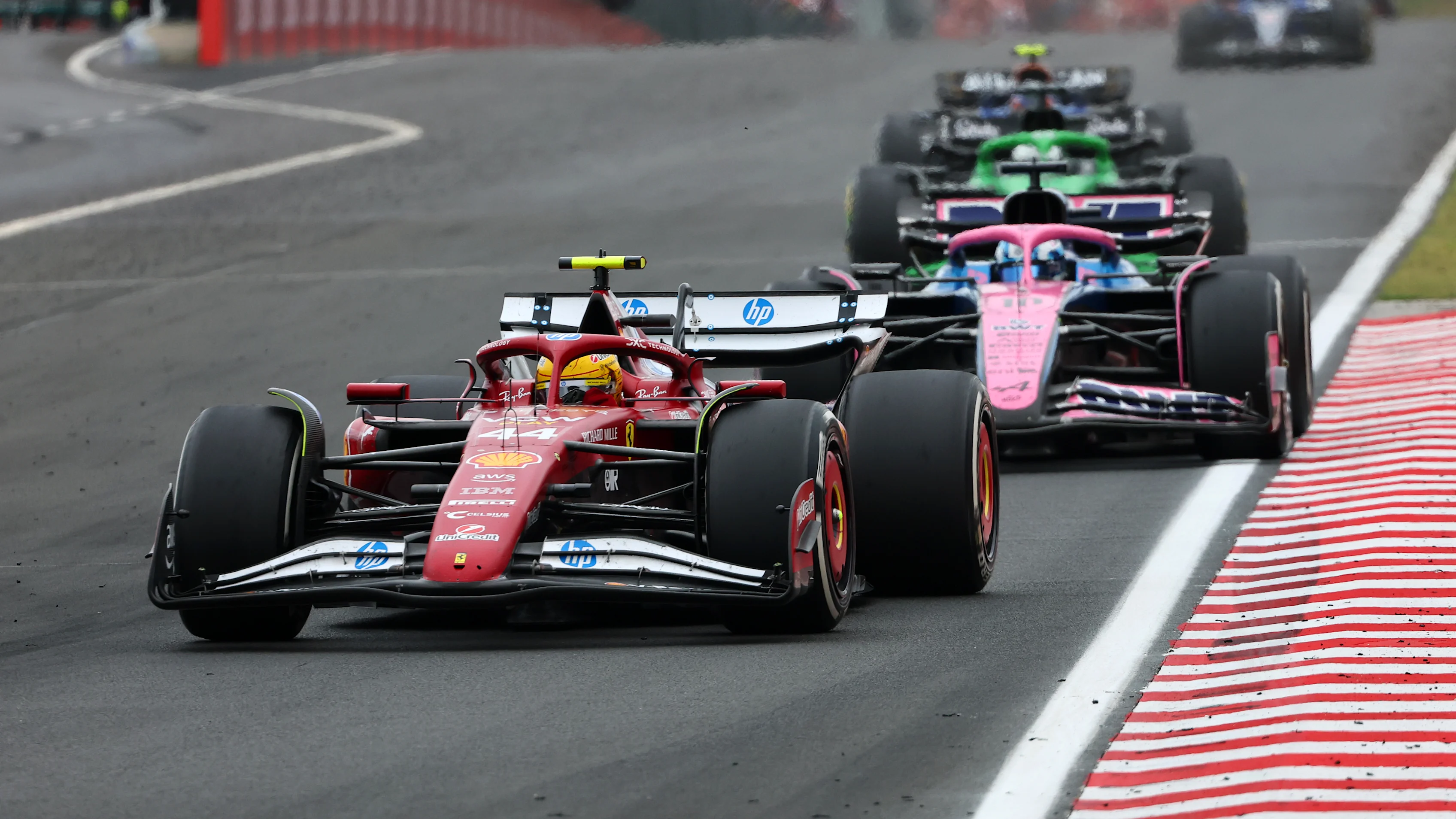 BUDAPEST, HUNGARY - AUGUST 03: Lewis Hamilton of Great Britain driving the (44) Scuderia Ferrari