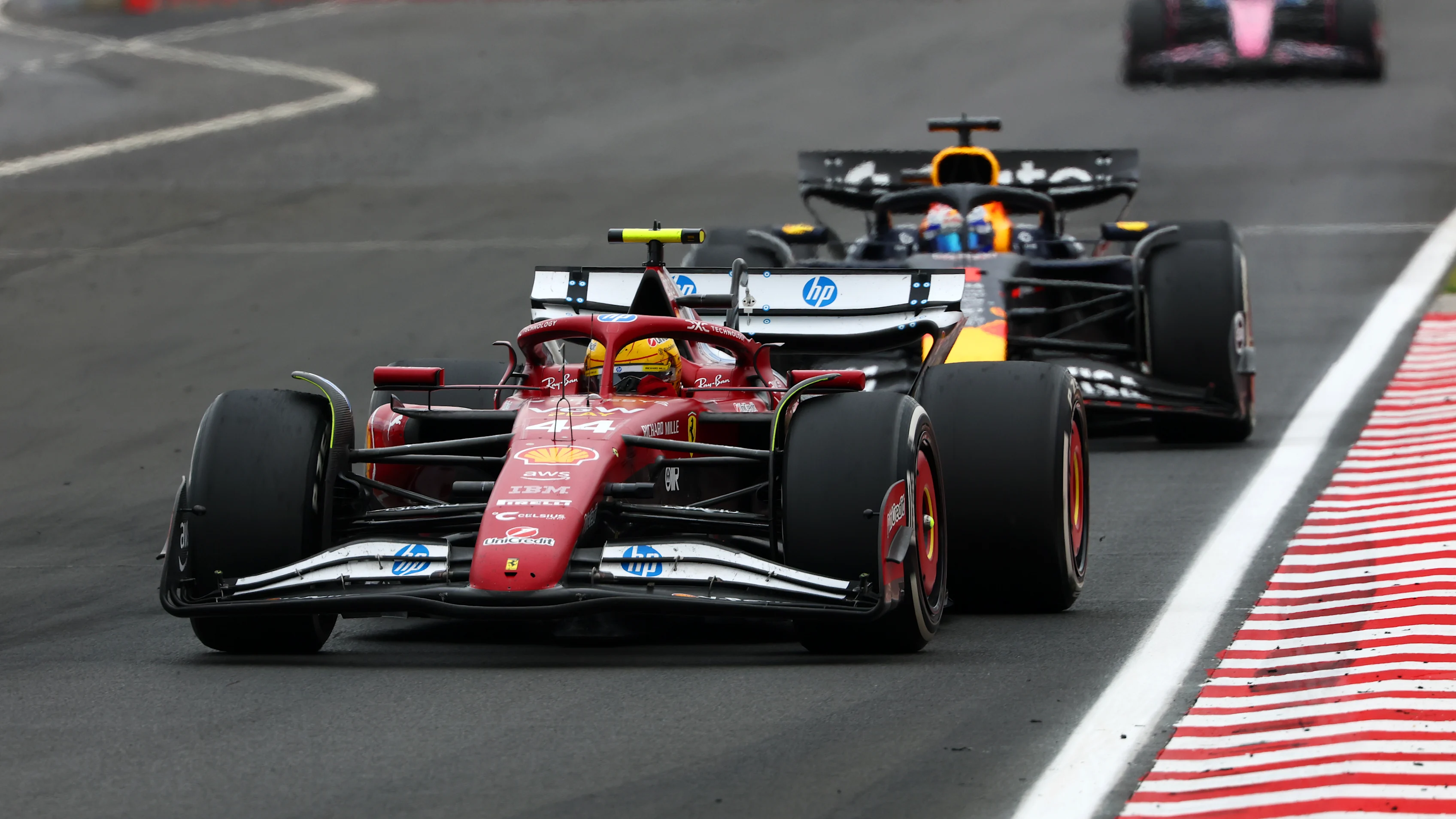 BUDAPEST, HUNGARY - AUGUST 03: Lewis Hamilton of Great Britain driving the (44) Scuderia Ferrari