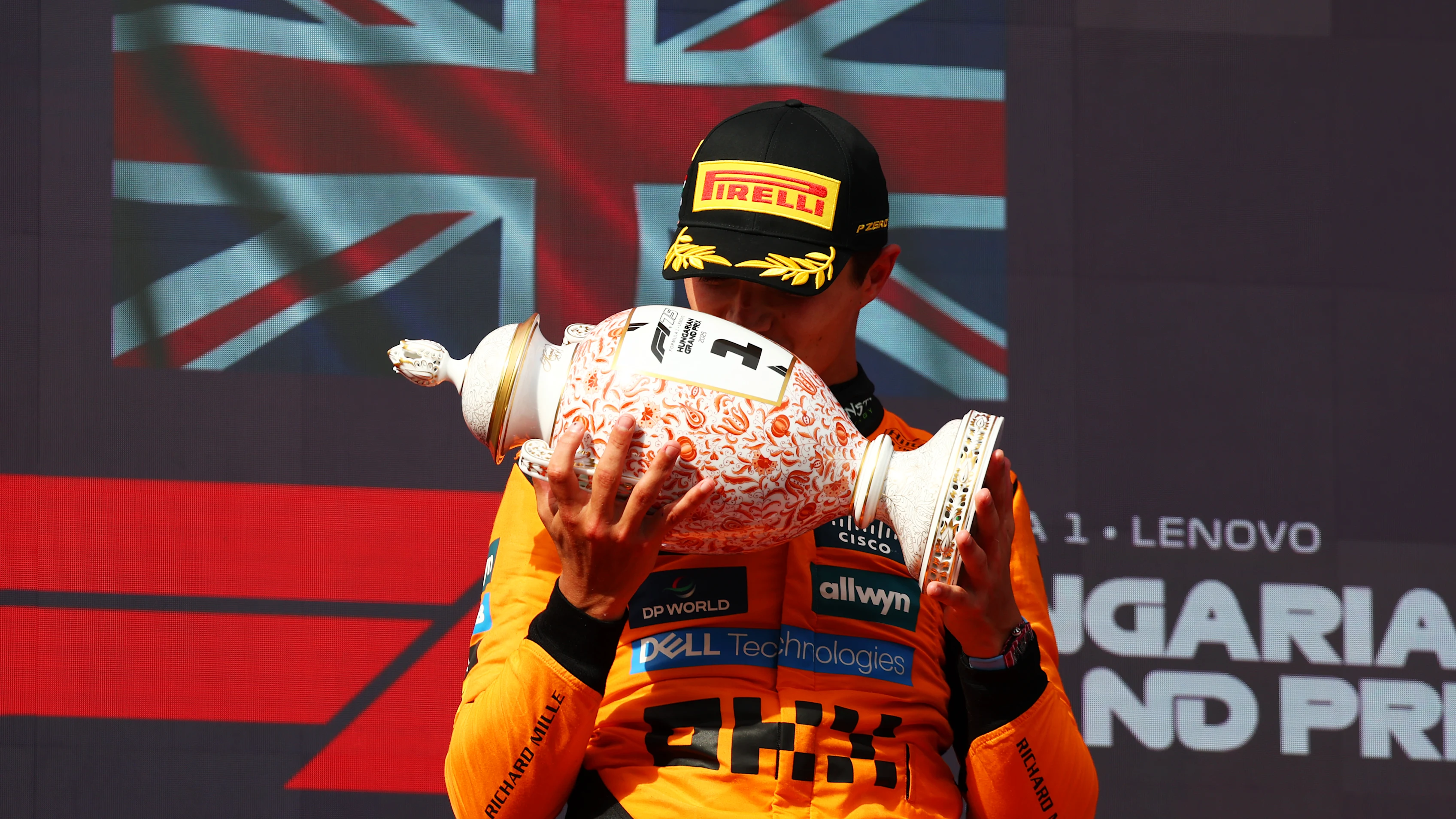 BUDAPEST, HUNGARY - AUGUST 03: Race winner Lando Norris of Great Britain and McLaren kisses his