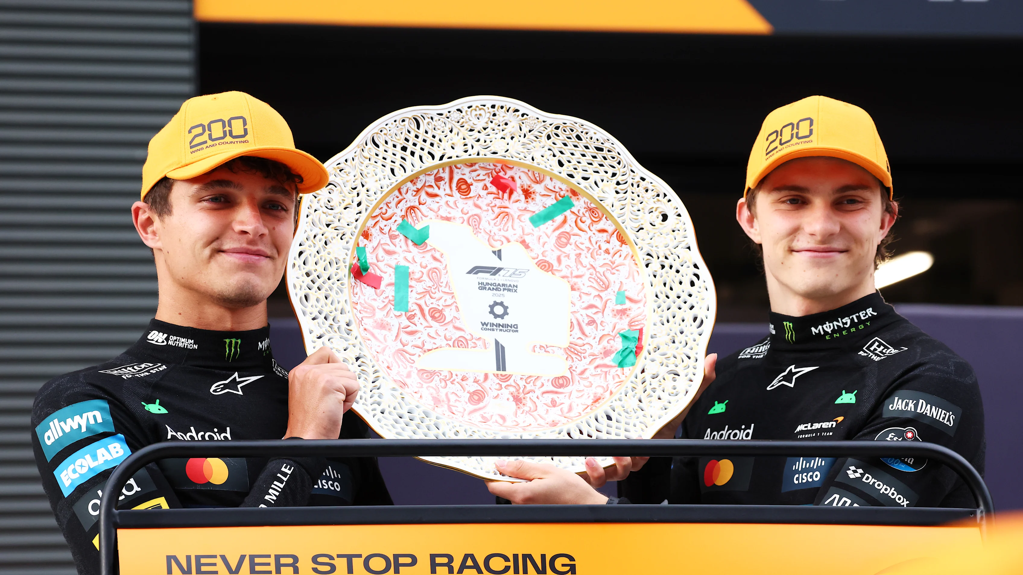 BUDAPEST, HUNGARY - AUGUST 03: Race winner Lando Norris of Great Britain and McLaren and Second