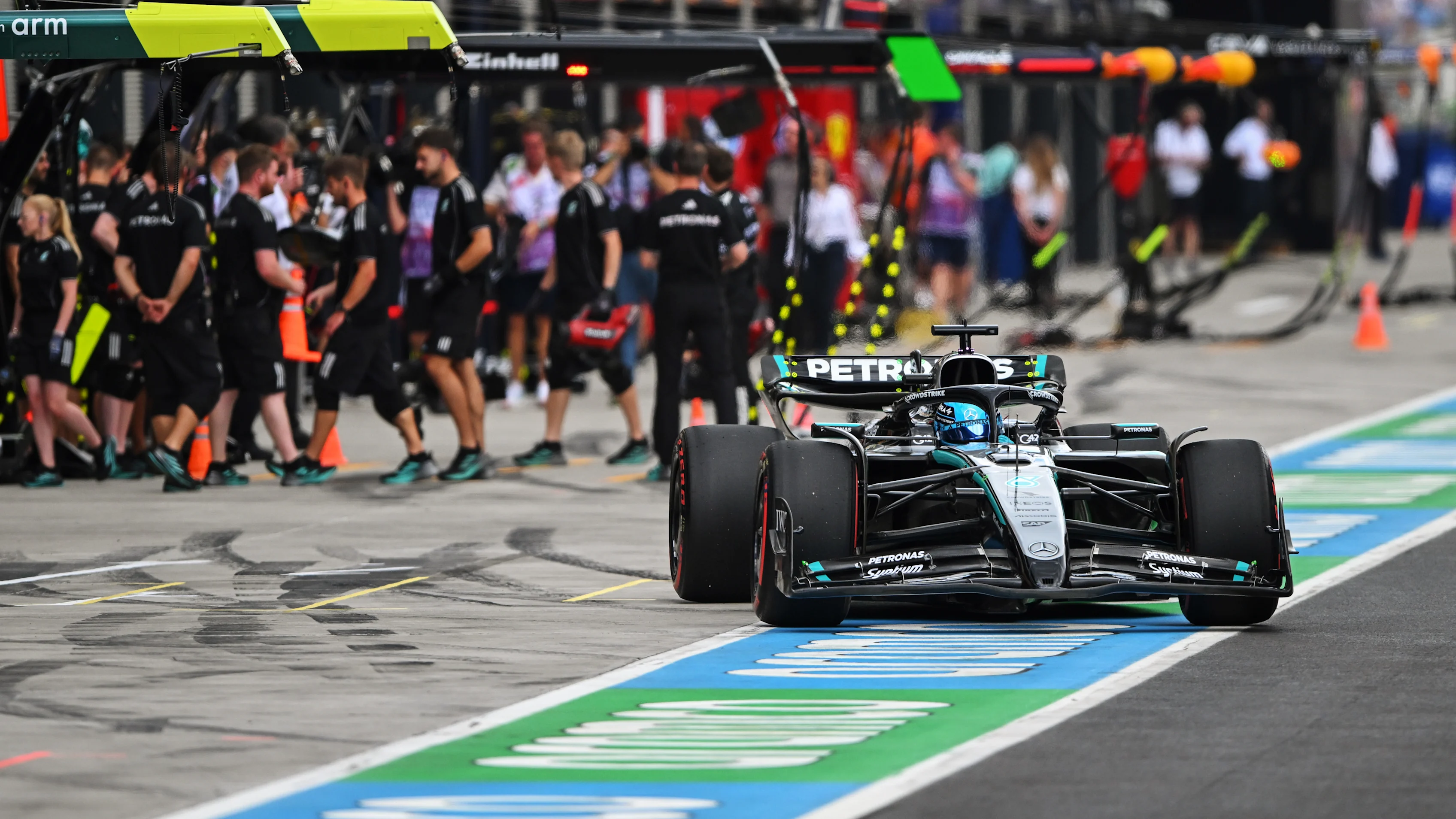 BUDAPEST, HUNGARY - AUGUST 01: George Russell of Great Britain driving the (63) Mercedes AMG Petronas F1 Team W16 in the Pitlane during practice ahead of the F1 Grand Prix of Hungary at Hungaroring on August 01, 2025 in Budapest, Hungary. (Photo by Rudy Carezzevoli/Getty Images)