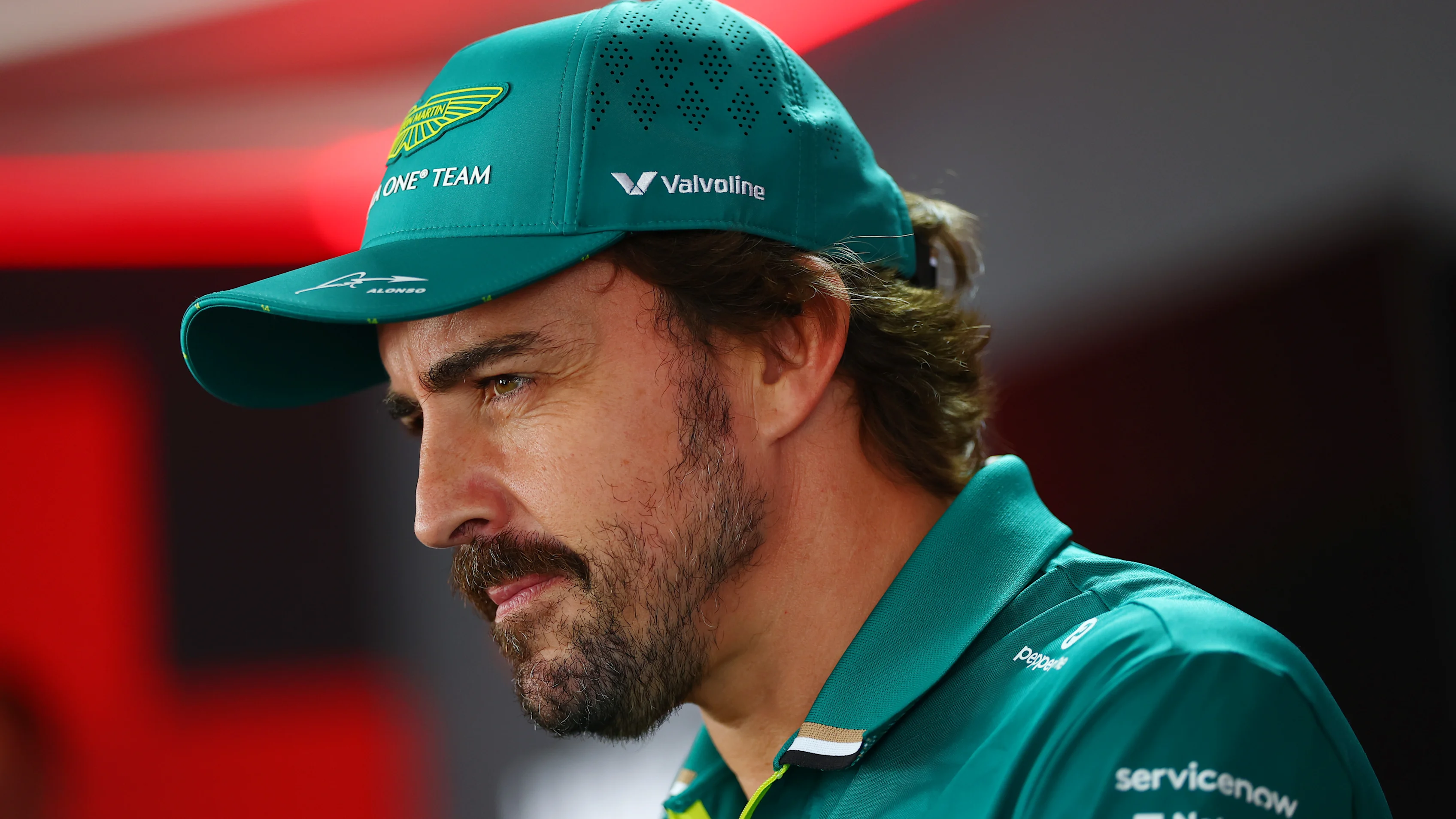 BUDAPEST, HUNGARY - JULY 31: Fernando Alonso of Spain and Aston Martin F1 Team talks to the media