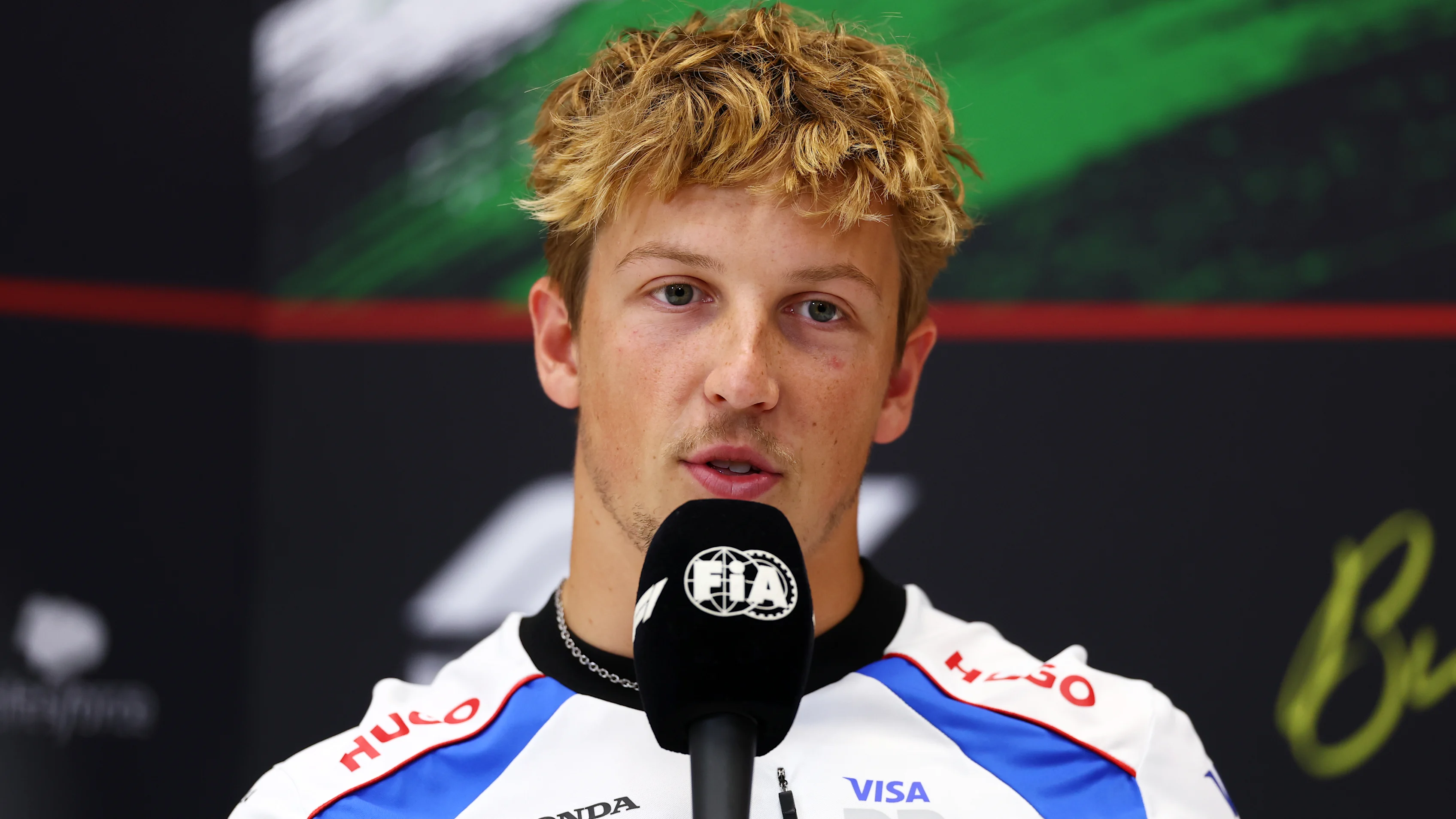 BUDAPEST, HUNGARY - JULY 31: Liam Lawson of New Zealand and Visa Cash App Racing Bulls speaks in