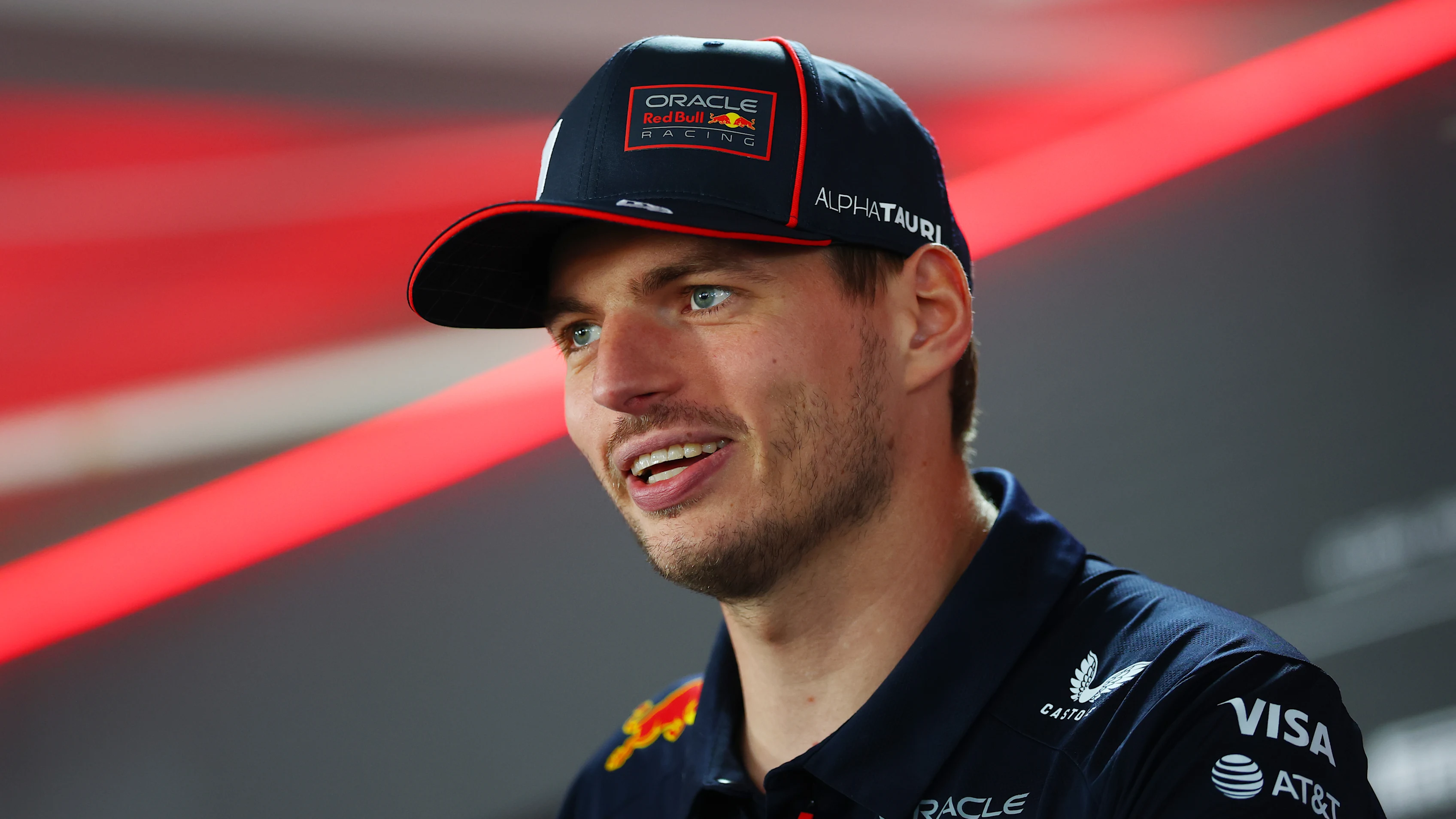 BUDAPEST, HUNGARY - JULY 31: Max Verstappen of the Netherlands and Oracle Red Bull Racing talks to