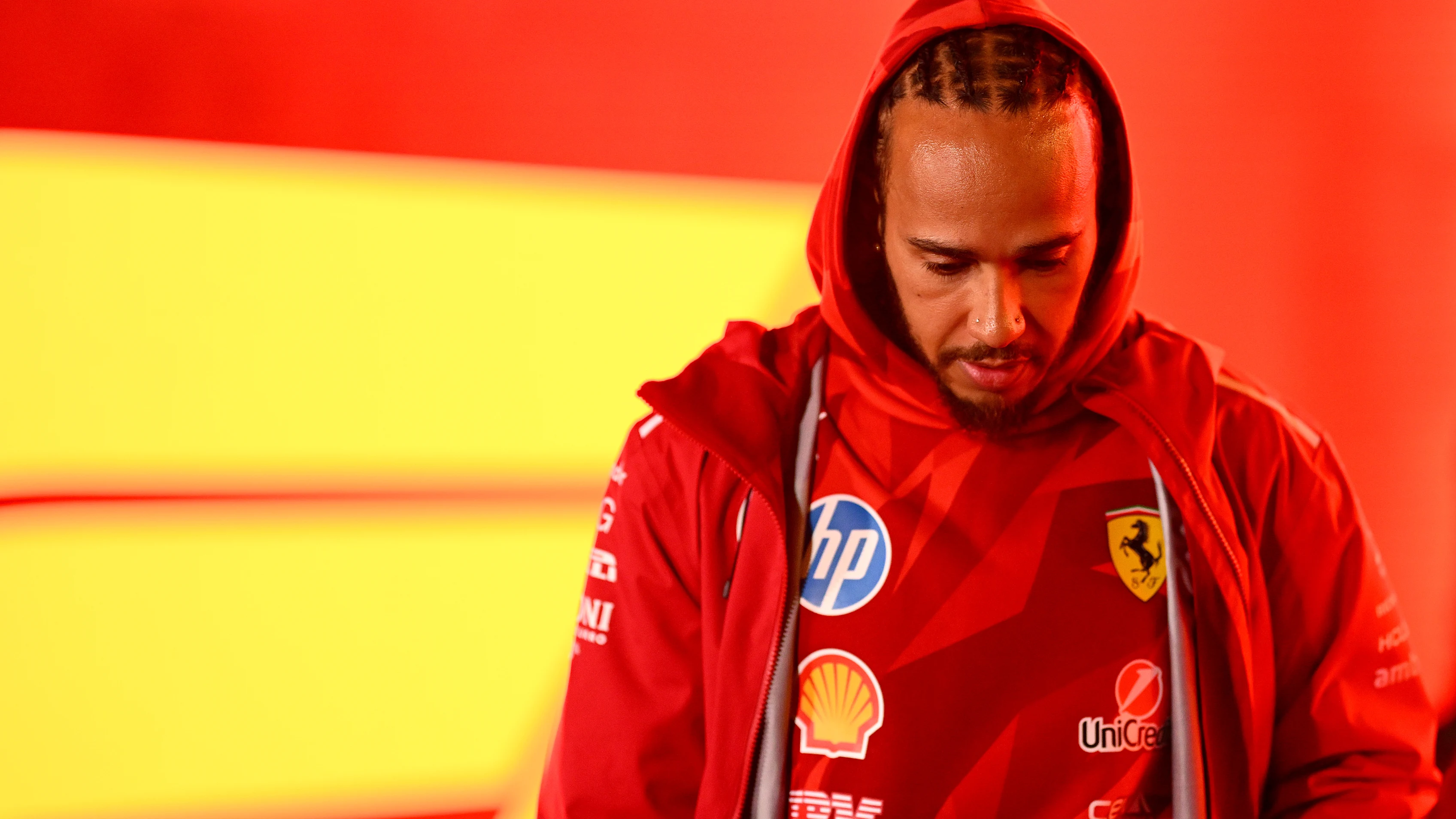 LAS VEGAS, NEVADA - NOVEMBER 19: Lewis Hamilton of Great Britain and Scuderia Ferrari looks on