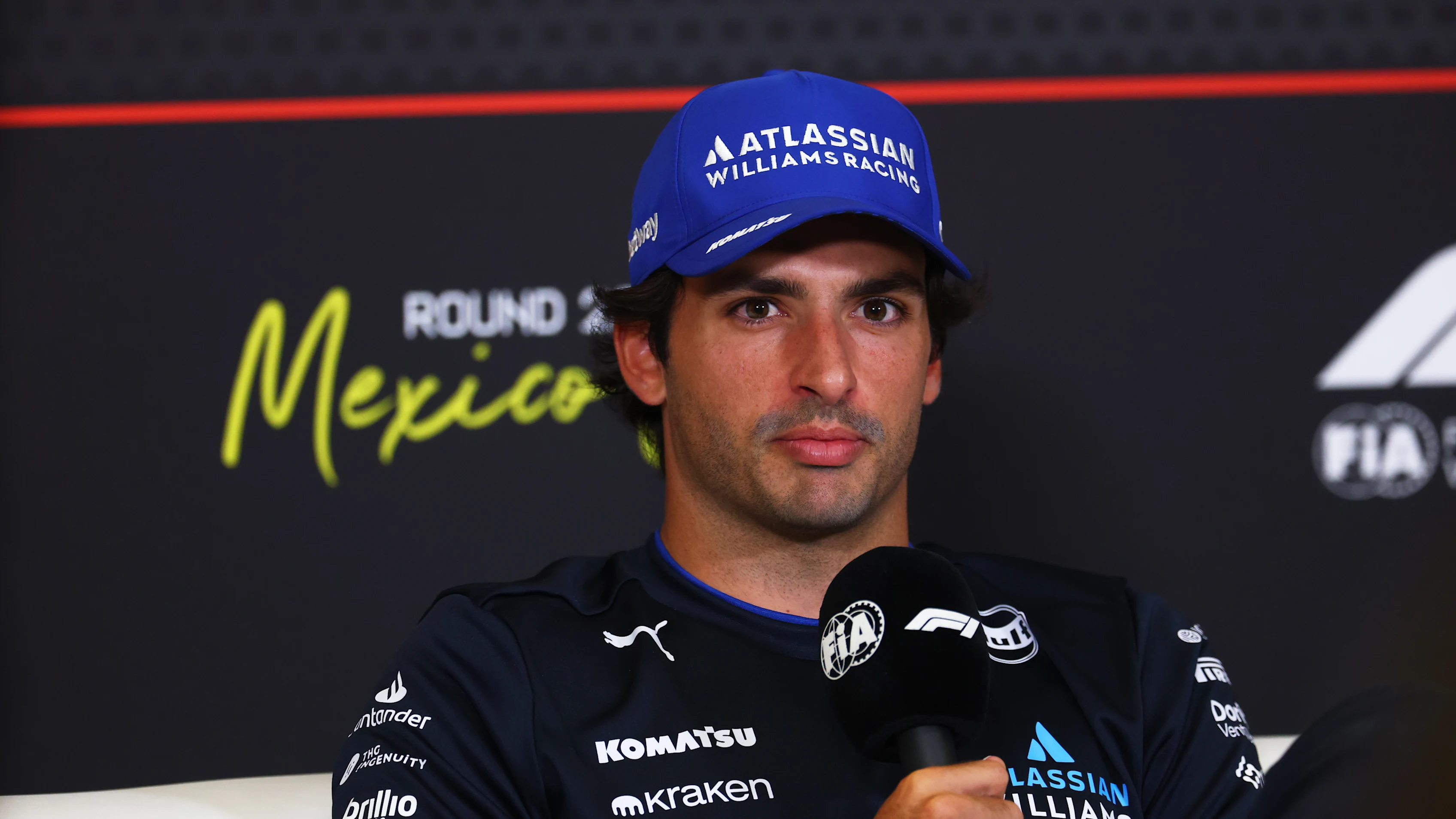 MEXICO CITY, MEXICO - OCTOBER 23: Carlos Sainz of Spain and Williams speaks in the Drivers Press Conference during previews ahead of the F1 Grand Prix of Mexico at Autodromo Hermanos Rodriguez on October 23, 2025 in Mexico City, Mexico. (Photo by Clive Rose/Getty Images)