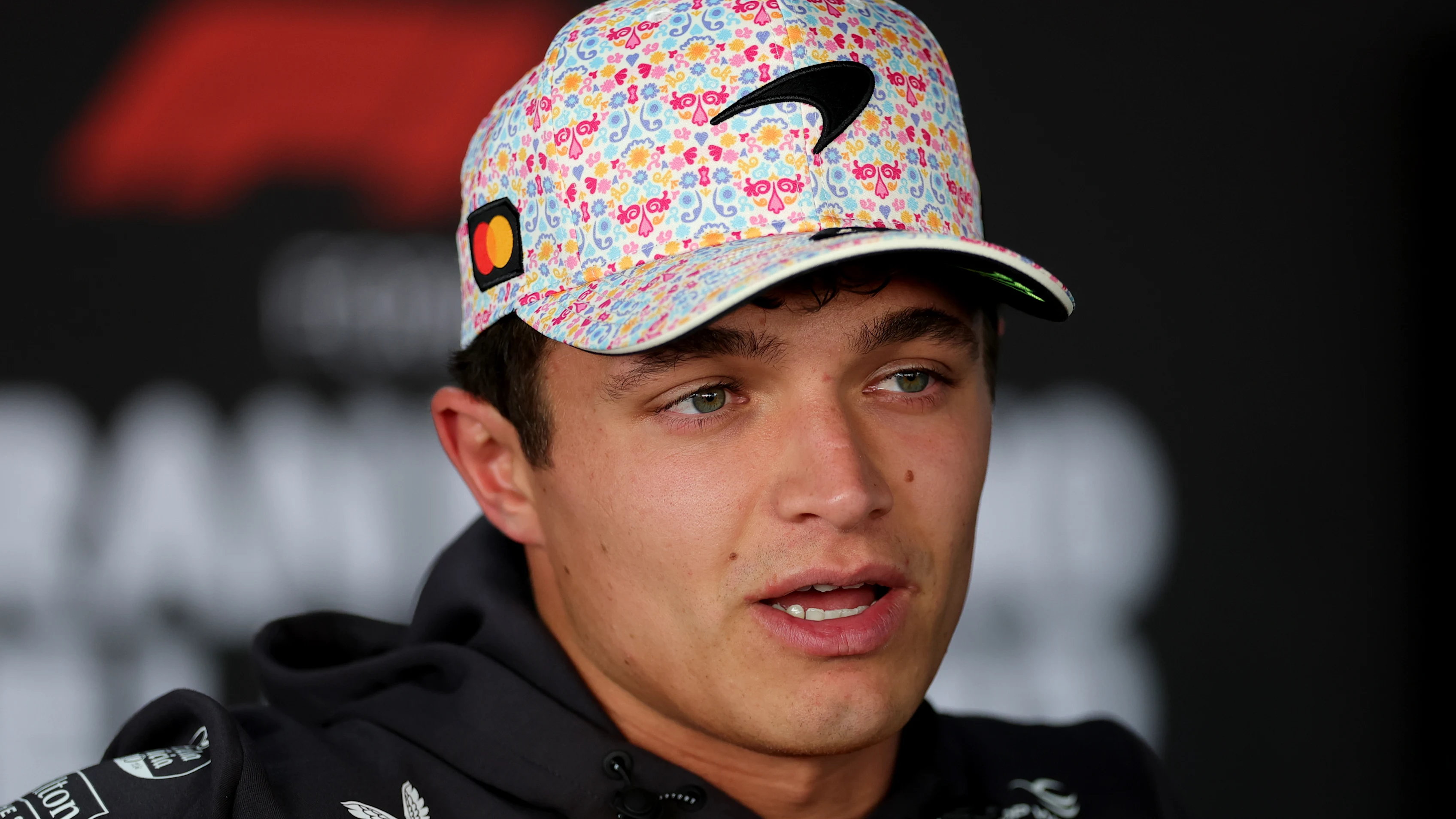 MEXICO CITY, MEXICO - OCTOBER 23: Lando Norris of Great Britain and McLaren talks to the media
