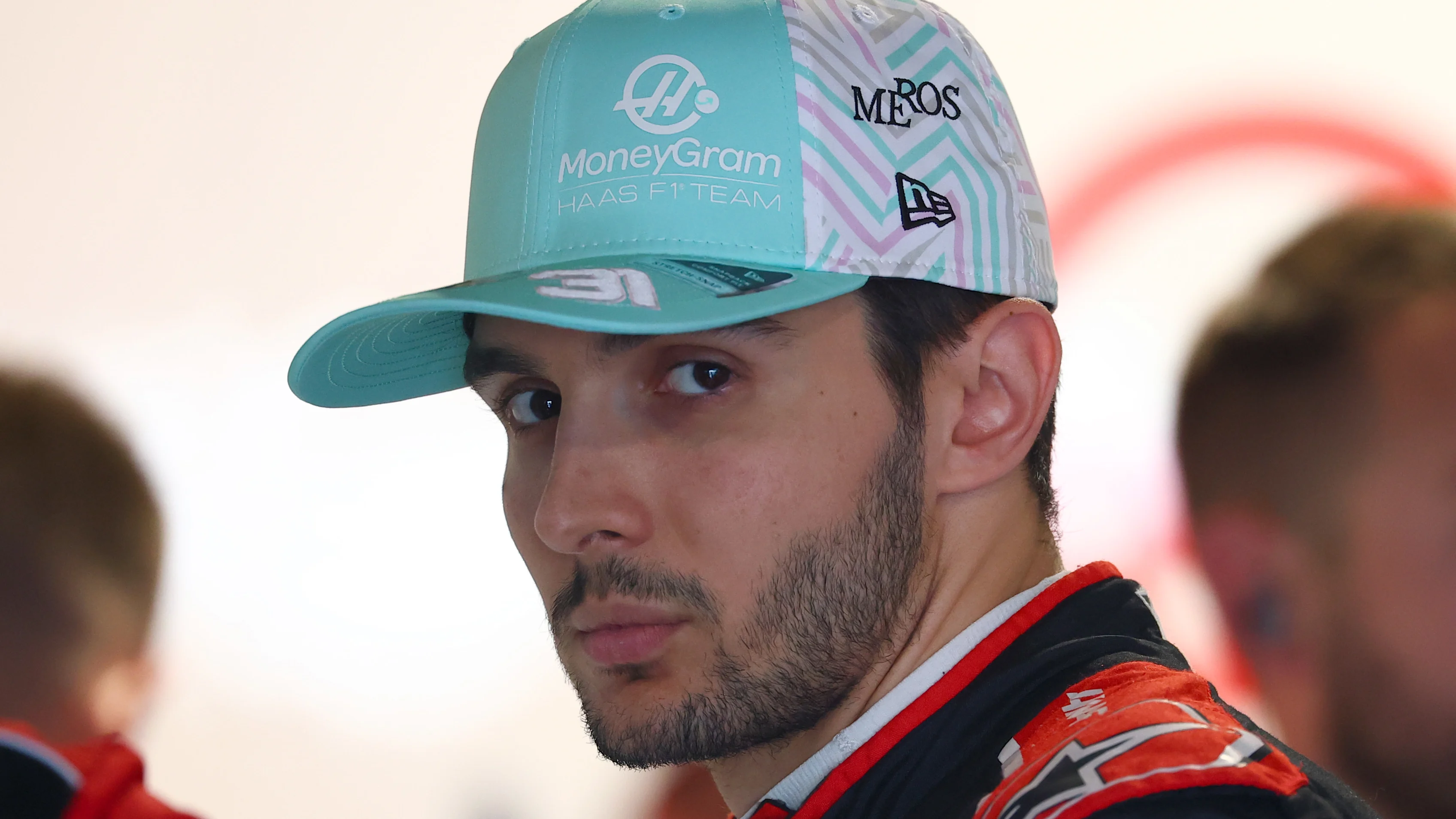 MIAMI, FLORIDA - MAY 02: Esteban Ocon of France and Haas F1 looks on in the garage during Sprint