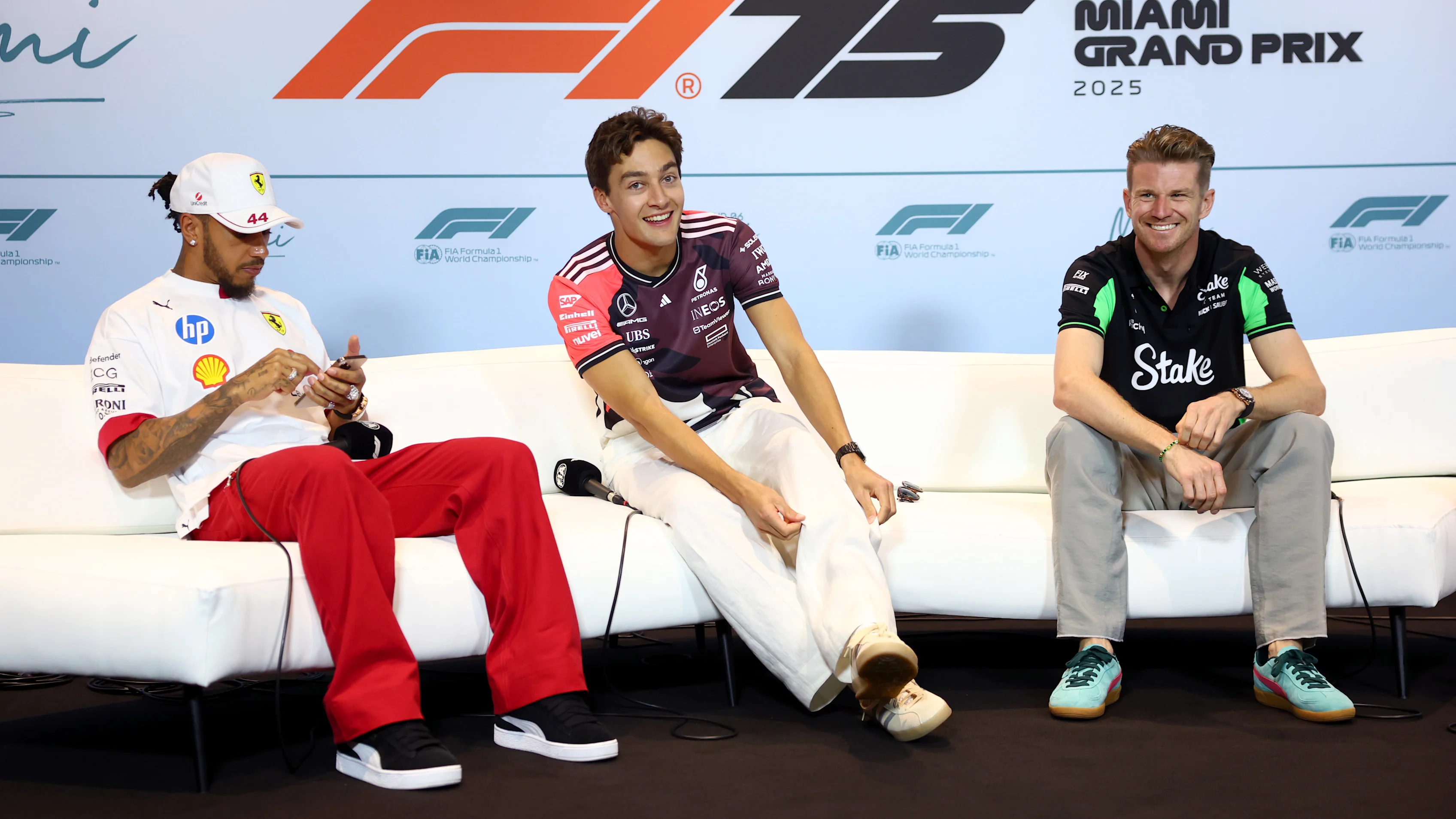 MIAMI, FLORIDA - MAY 01: Lewis Hamilton of Great Britain and Scuderia Ferrari, George Russell of