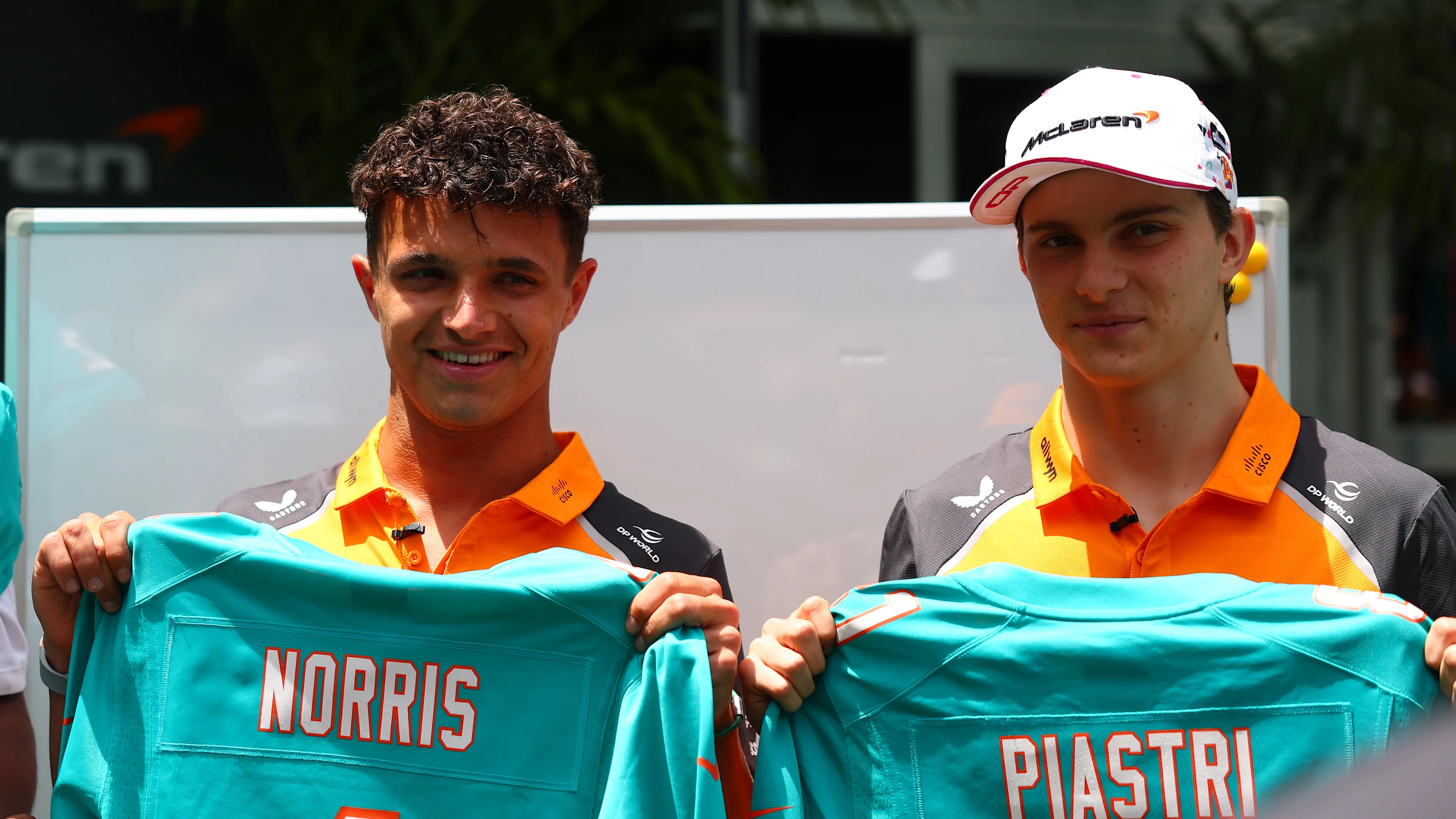 MIAMI, FLORIDA - MAY 01: Lando Norris of Great Britain and McLaren arrives in the Paddock during