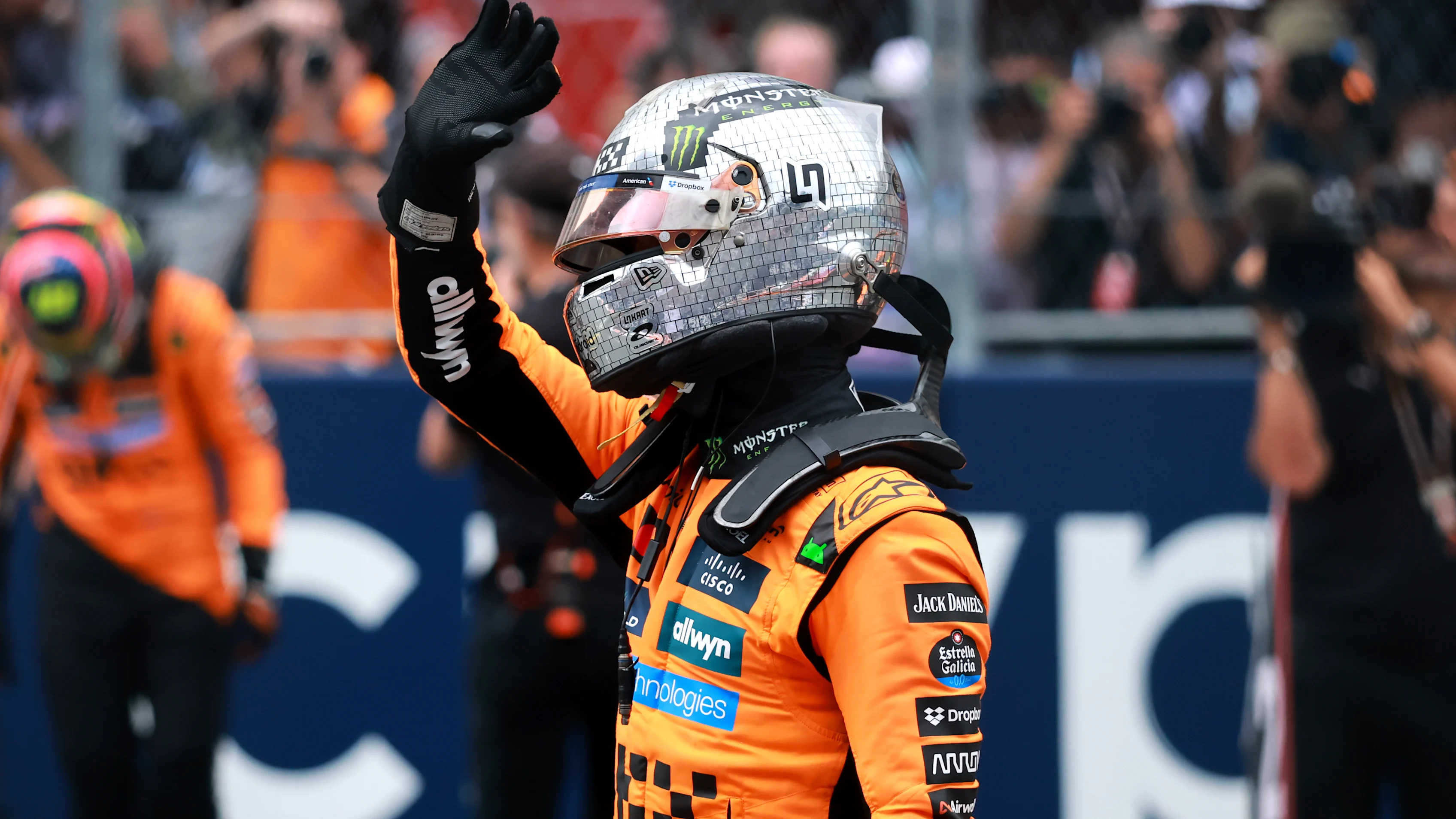MIAMI, FLORIDA - MAY 03: Sprint winner Lando Norris of Great Britain and McLaren waves in parc