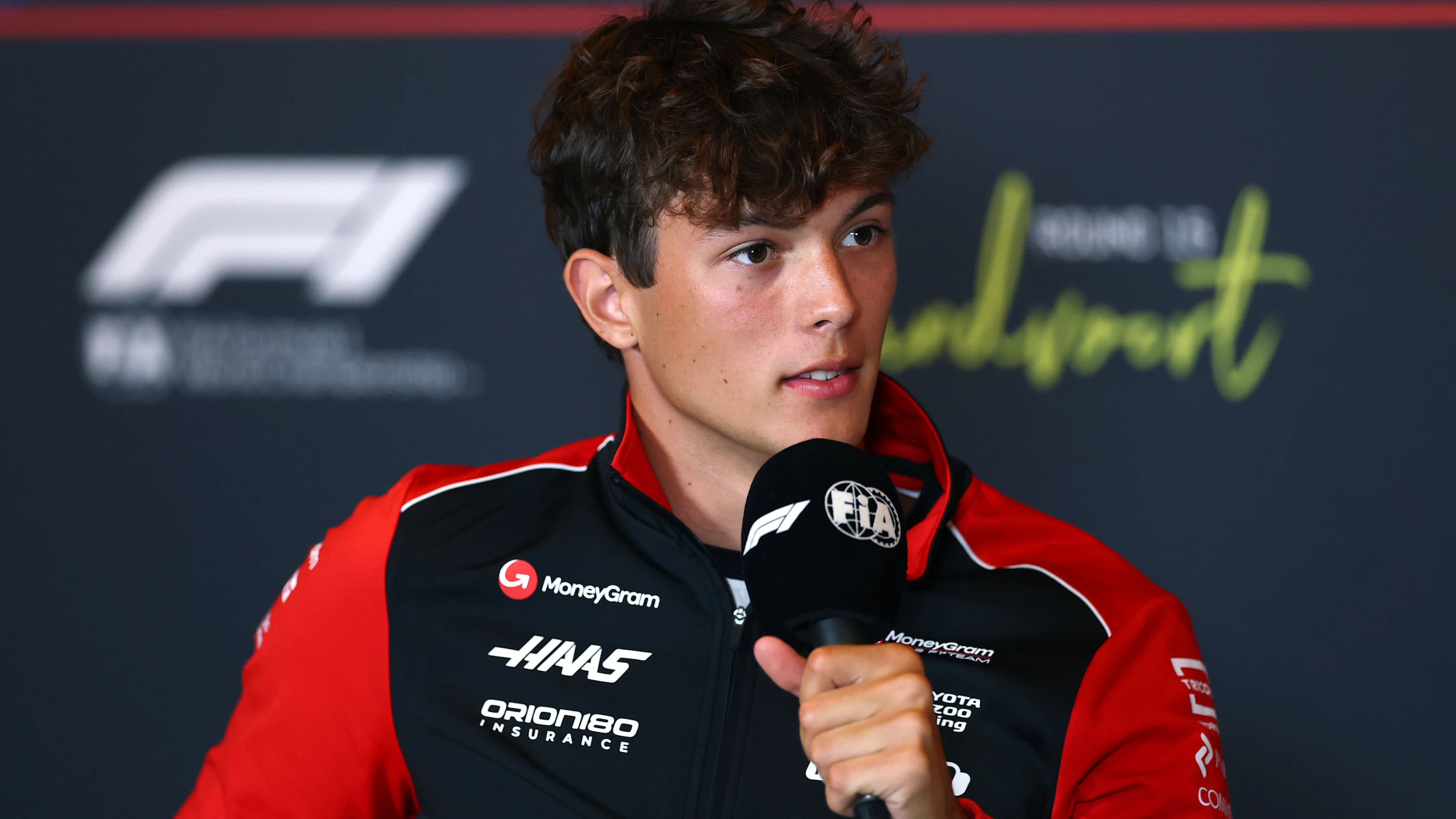 ZANDVOORT, NETHERLANDS - AUGUST 28: Oliver Bearman of Great Britain and Haas F1 speaks in the Drivers Press Conference during previews ahead of the F1 Grand Prix of Netherlands at Circuit Zandvoort on August 28, 2025 in Zandvoort, Netherlands. (Photo by Clive Rose/Getty Images)