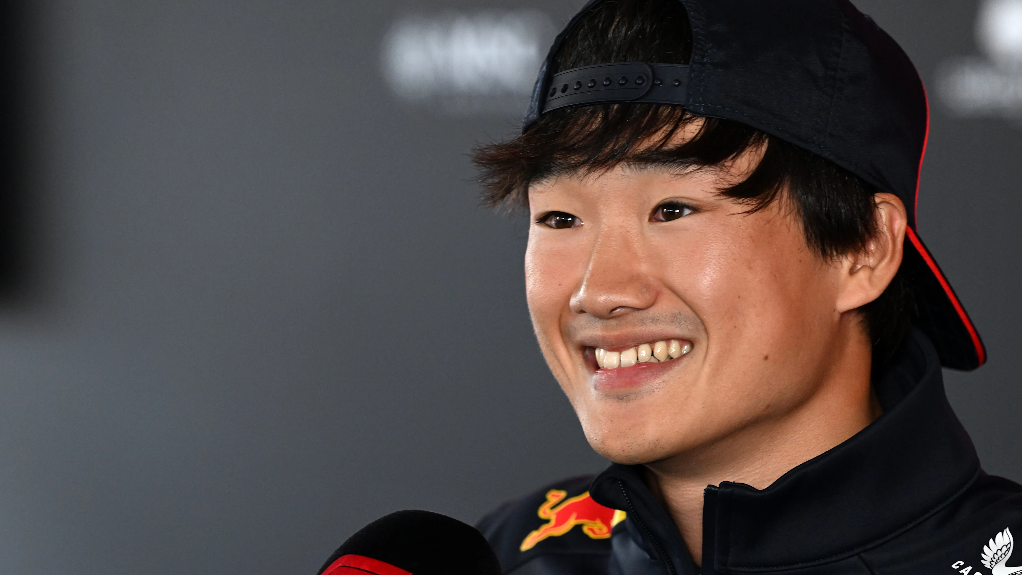 ZANDVOORT, NETHERLANDS - AUGUST 28: Yuki Tsunoda of Japan and Oracle Red Bull Racing talks to the