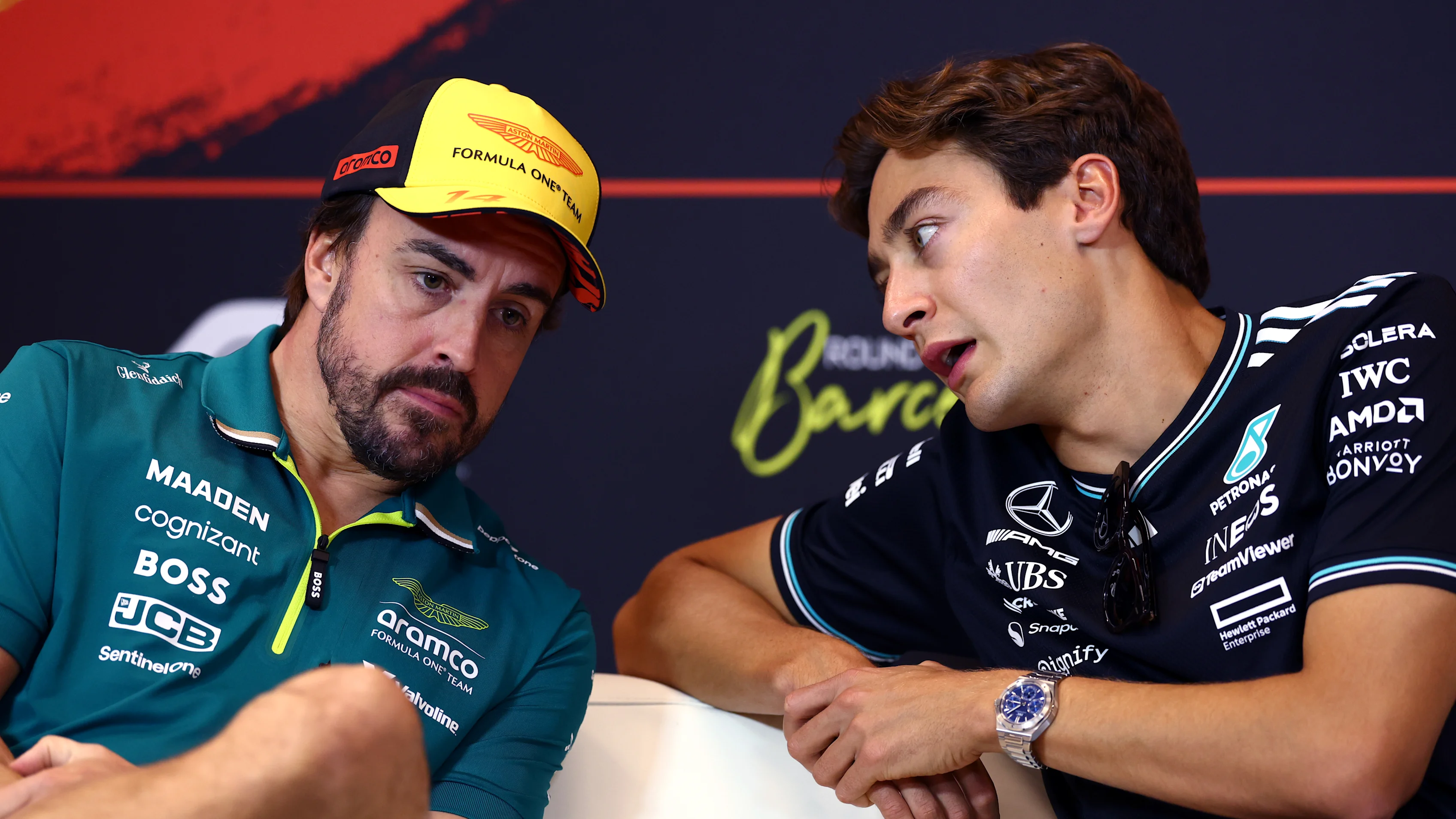 BARCELONA, SPAIN - MAY 29: Fernando Alonso of Spain and Aston Martin F1 Team and George Russell of