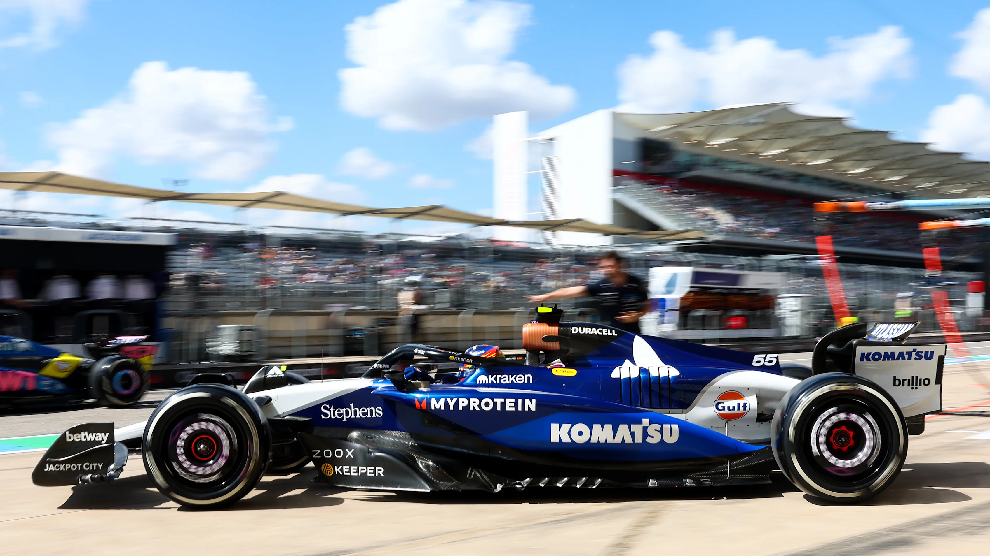 AUSTIN, TEXAS - OCTOBER 17: Carlos Sainz of Spain driving the (55) Williams FW47 Mercedes leaves