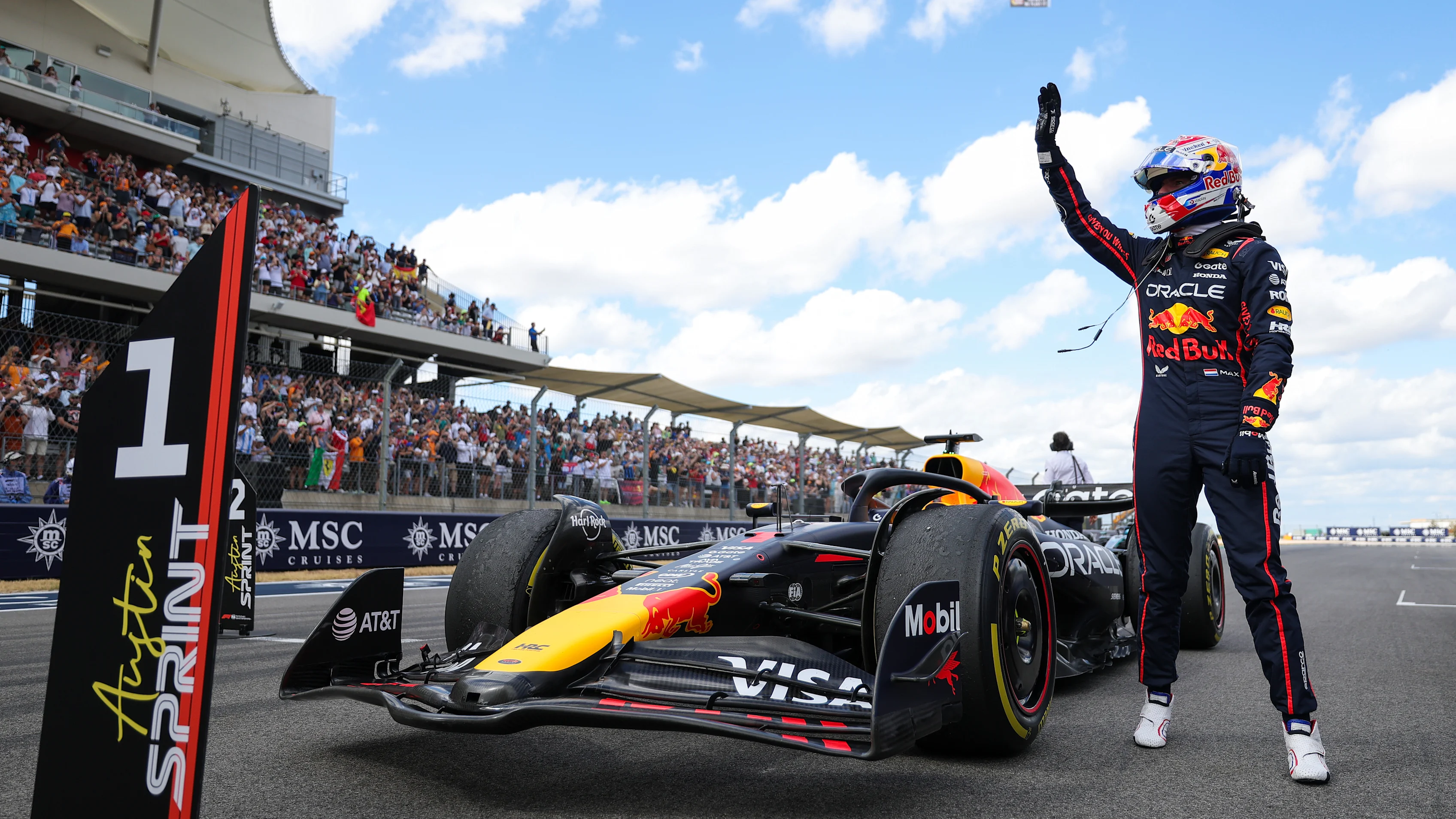 AUSTIN, TEXAS - OCTOBER 18: Sprint winner Max Verstappen of the Netherlands and Oracle Red Bull Racing waves in parc ferme during the Sprint ahead of the F1 Grand Prix of United States at Circuit of The Americas on October 18, 2025 in Austin, Texas. (Photo by Bryn Lennon - Formula 1/Formula 1 via Getty Images)