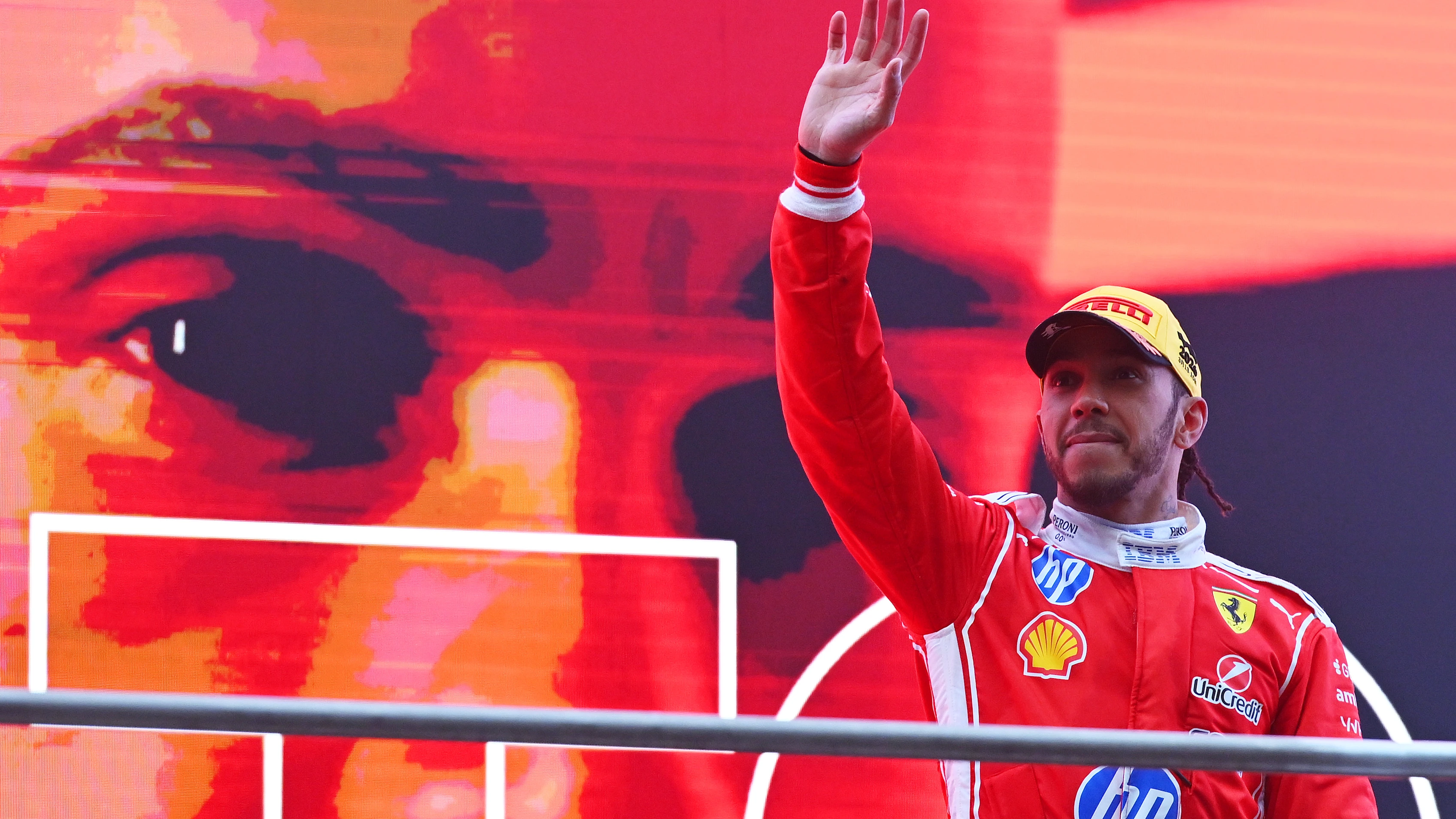 SHANGHAI, CHINA - MARCH 15: Third placed Lewis Hamilton of Great Britain and Scuderia Ferrari waves