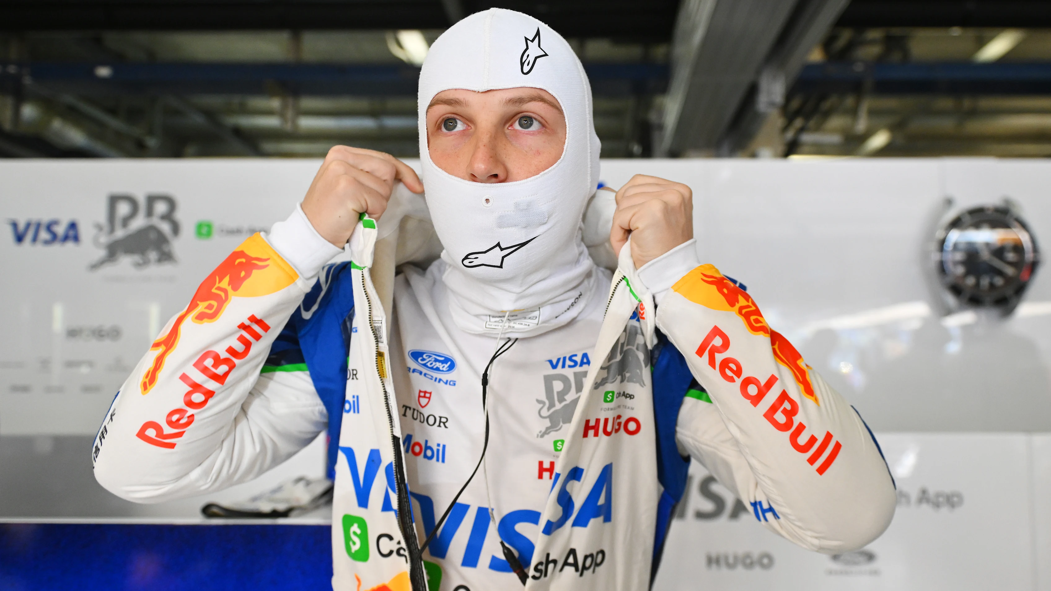 SHANGHAI, CHINA - MARCH 13: Liam Lawson of New Zealand and Visa Cash App Racing Bulls prepares to drive in the garage  during practice ahead of the F1 Grand Prix of China at Shanghai International Circuit on March 13, 2026 in Shanghai, China. (Photo by Rudy Carezzevoli/Getty Images)
