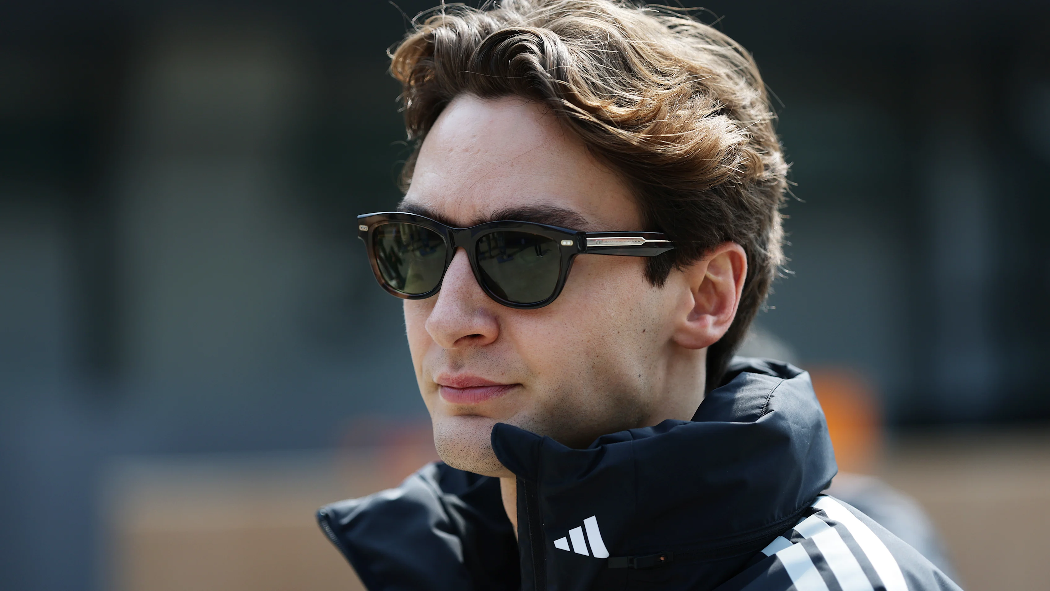 SHANGHAI, CHINA - MARCH 12: George Russell of Great Britain and Mercedes AMG Petronas F1 Team walks