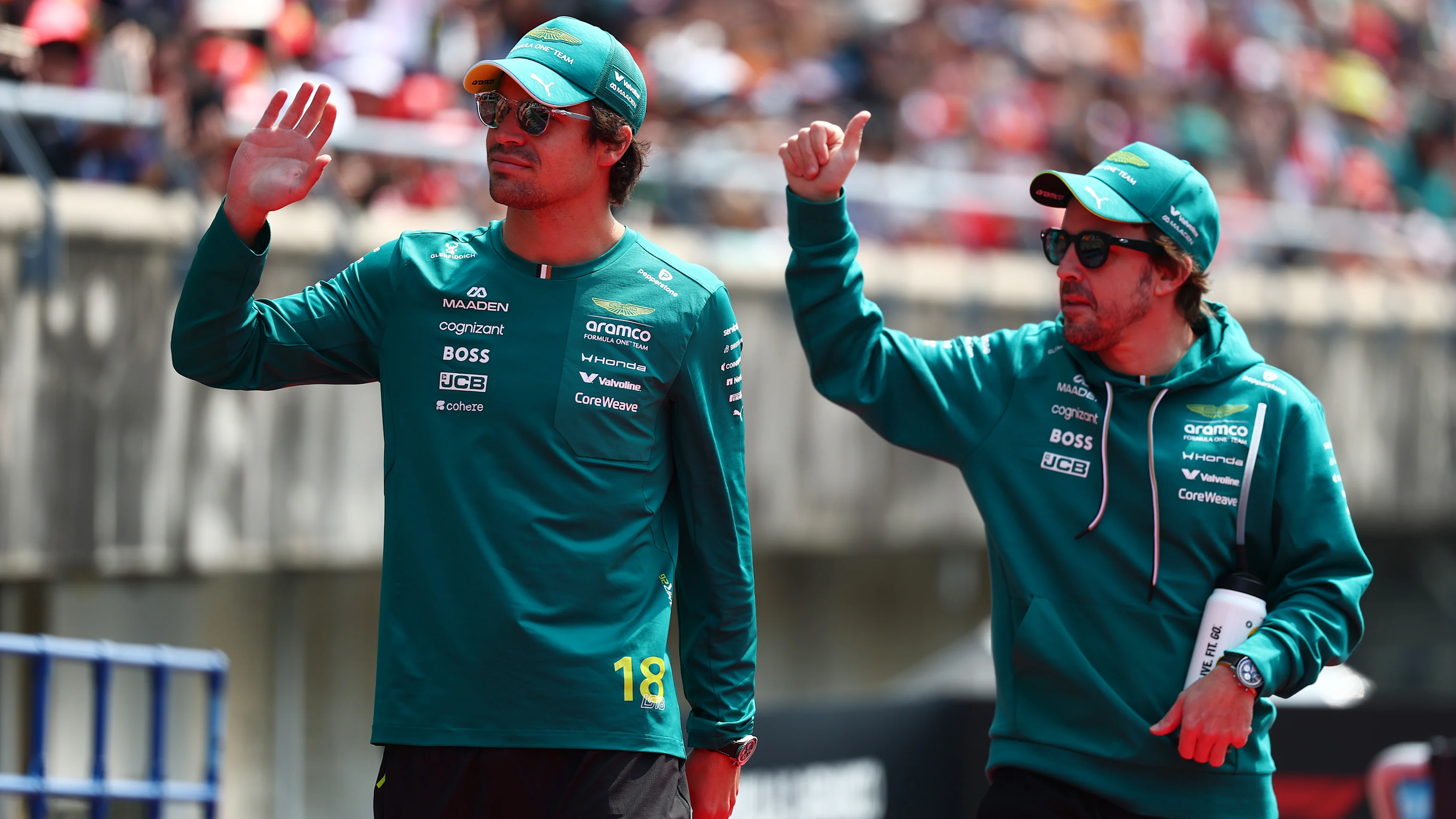 SUZUKA, JAPAN - MARCH 29: Lance Stroll of Canada and Aston Martin F1 Team and Fernando Alonso of Spain and Aston Martin F1 Team on the drivers parade prior to the F1 Grand Prix of Japan at Suzuka Circuit on March 29, 2026 in Suzuka, Japan. (Photo by Clive Rose - Formula 1/Formula 1 via Getty Images)