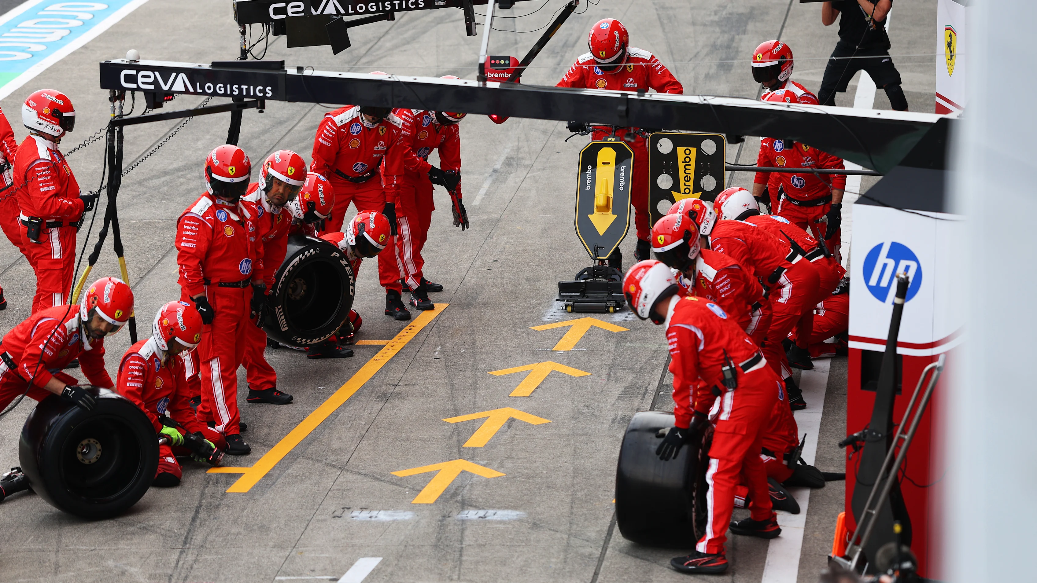 SUZUKA, JAPAN - MARCH 29: The Ferrari pit crew ready for a pitstop during the F1 Grand Prix of