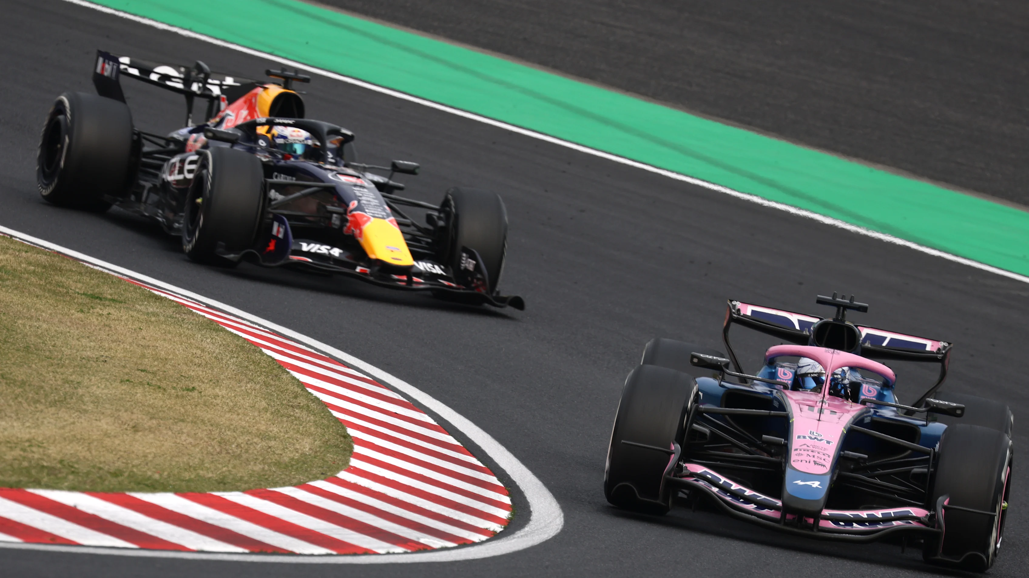 SUZUKA, JAPAN - MARCH 29: Pierre Gasly of France driving the (10) Alpine F1 A526 Mercedes leads Max