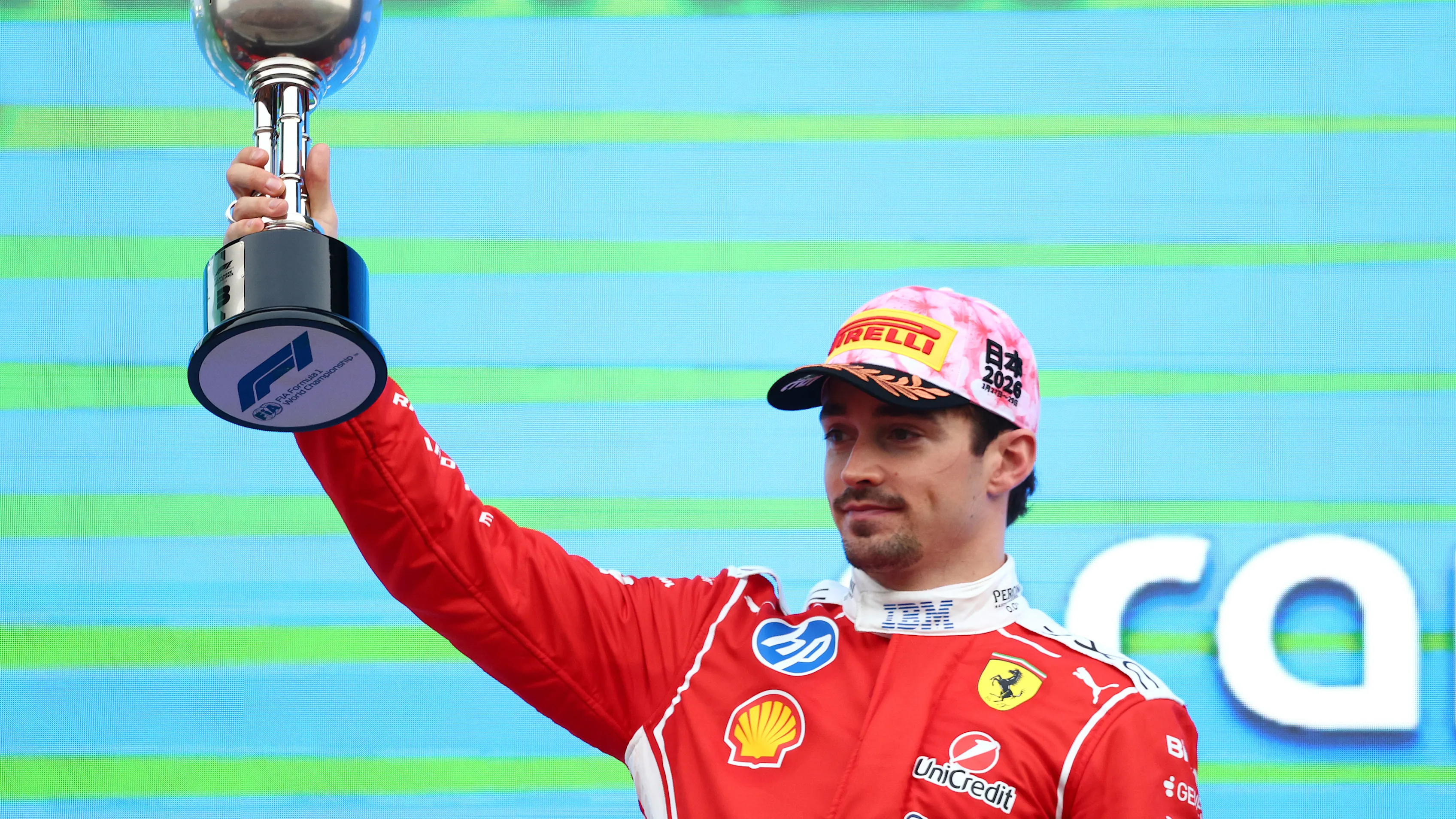 SUZUKA, JAPAN - MARCH 29: Third placed Charles Leclerc of Monaco and Scuderia Ferrari lifts his