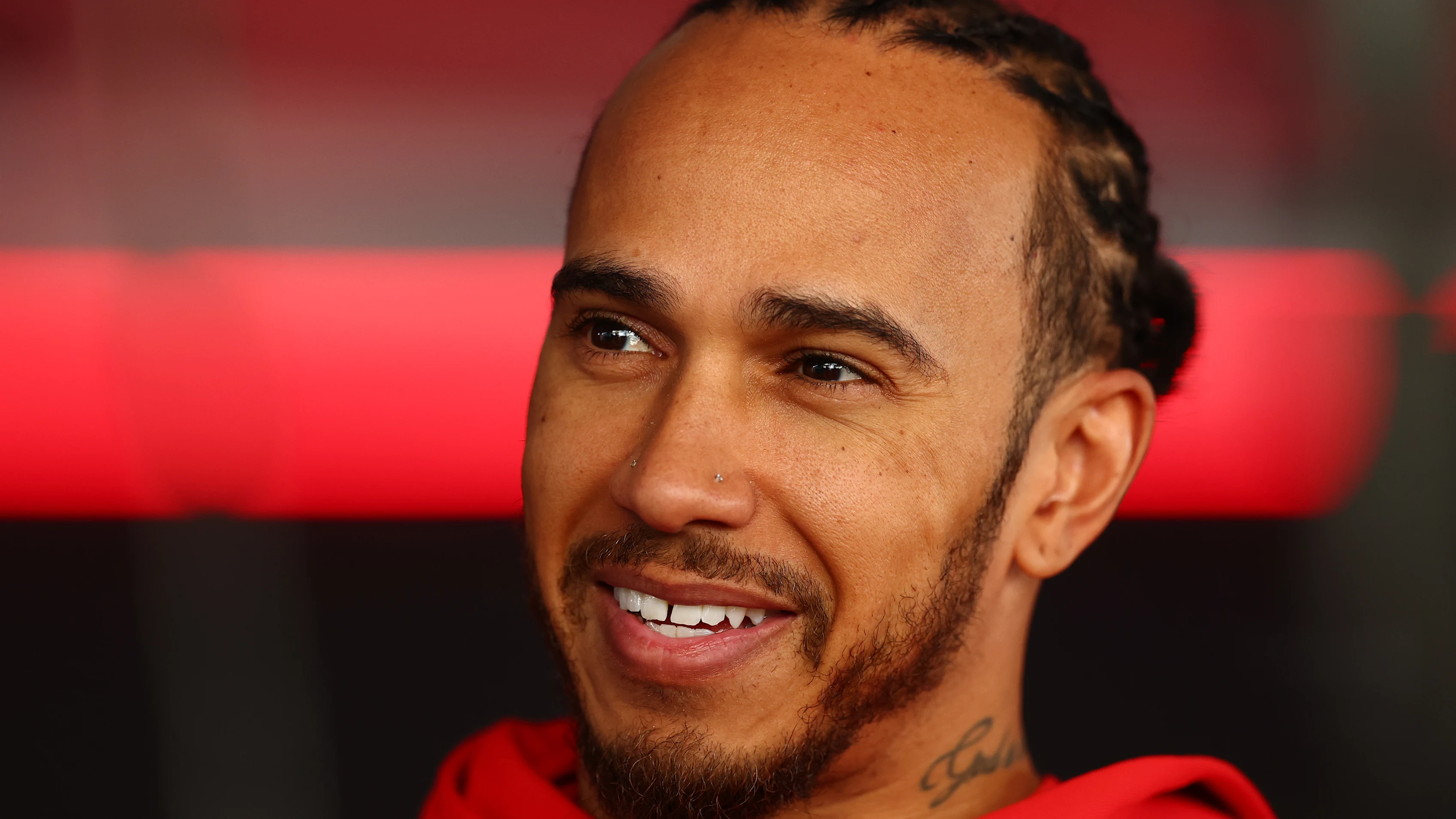 SUZUKA, JAPAN - MARCH 27: Lewis Hamilton of Great Britain and Scuderia Ferrari is interviewed