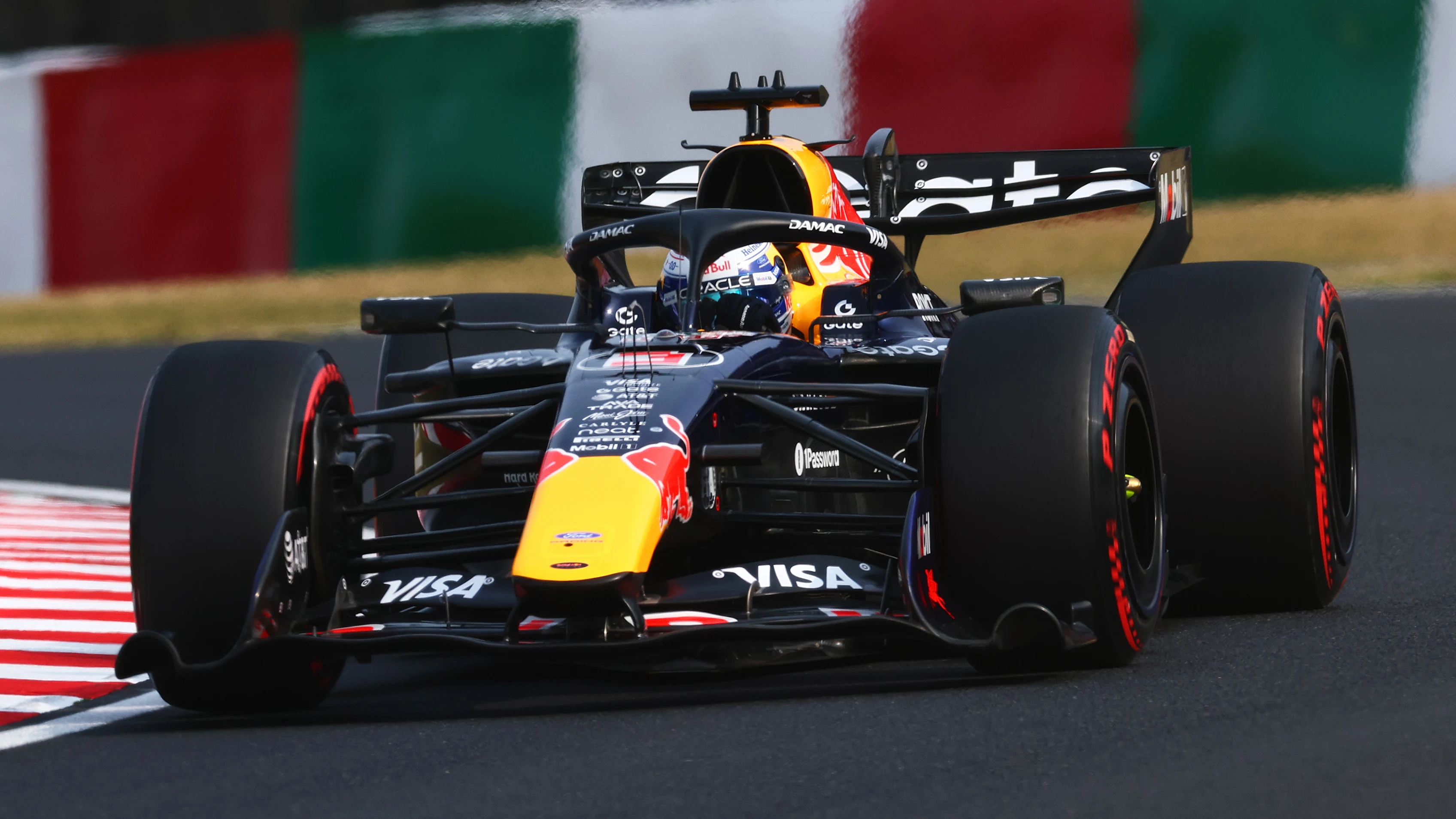 SUZUKA, JAPAN - MARCH 28: Max Verstappen of the Netherlands driving the (3) Oracle Red Bull Racing