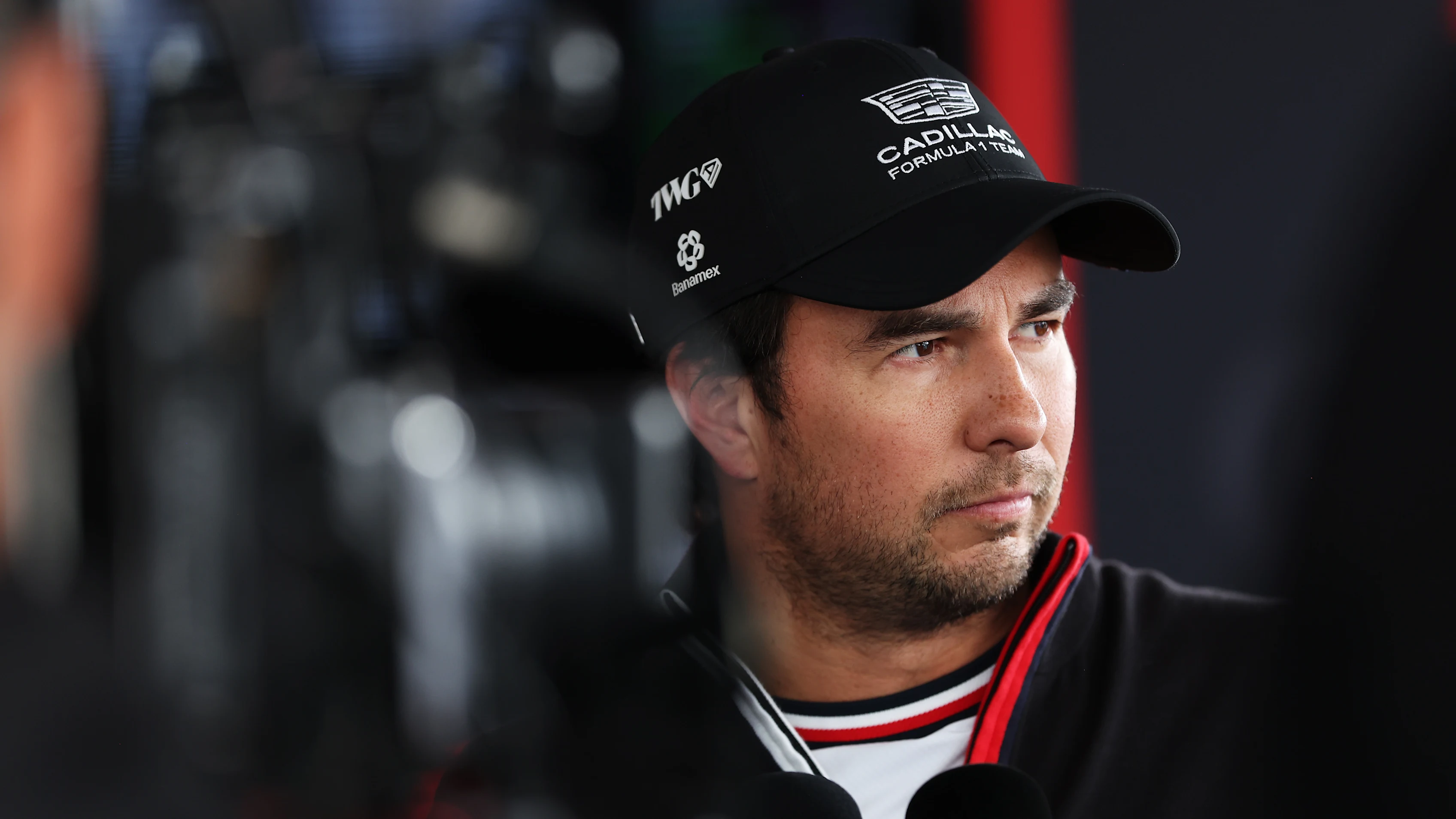 SUZUKA, JAPAN - MARCH 28: Nineteenth placed qualifier Sergio Perez of Mexico and Cadillac F1 Team