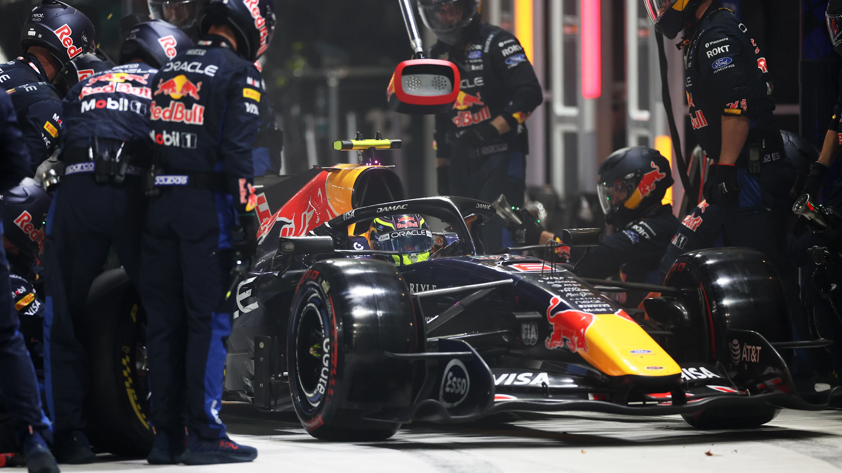 SINGAPORE, SINGAPORE - OCTOBER 11: Isack Hadjar of France driving the (6) Oracle Red Bull Racing