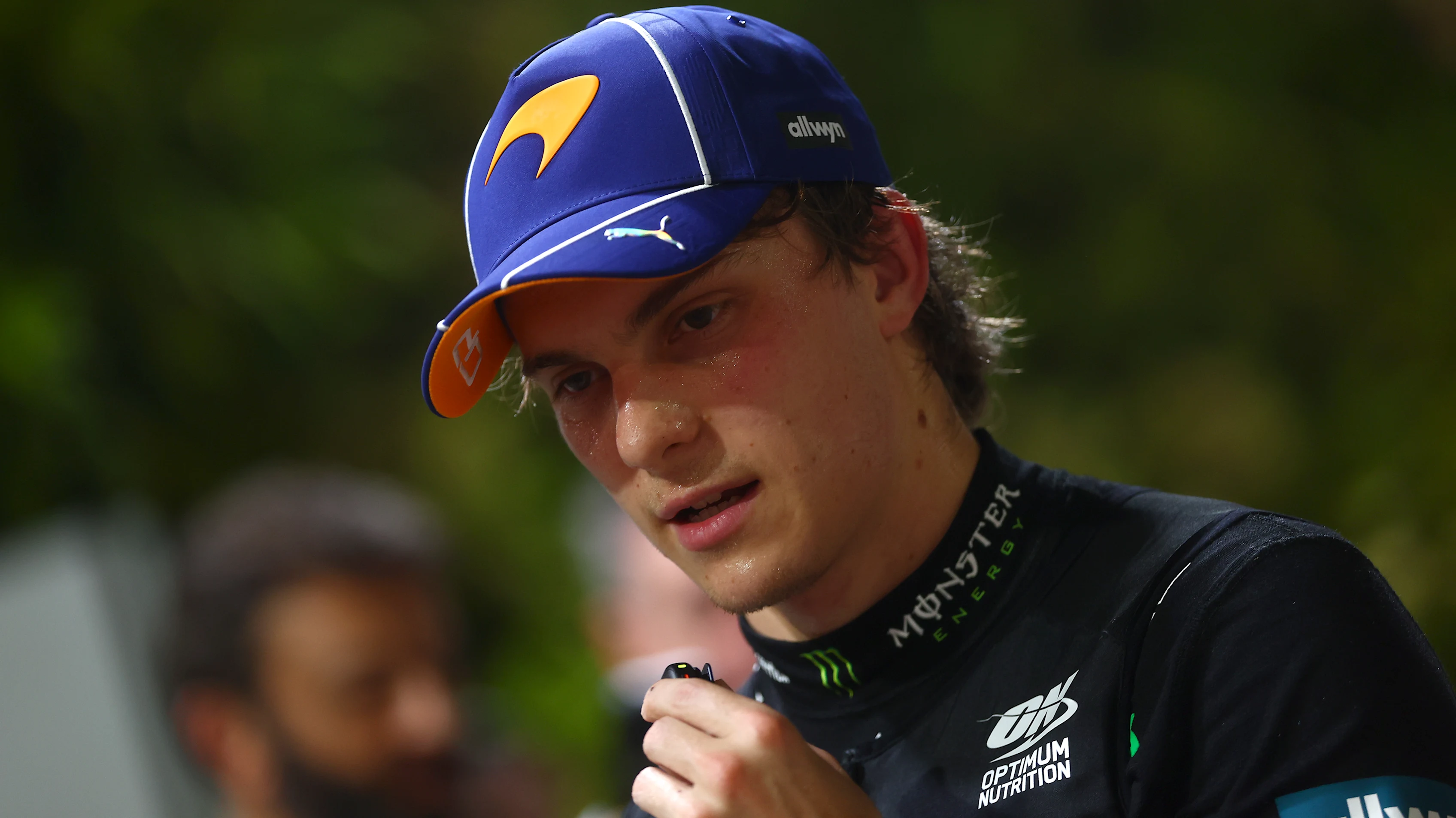 SINGAPORE, SINGAPORE - OCTOBER 09: Fourth placed qualifier Oscar Piastri of Australia and McLaren