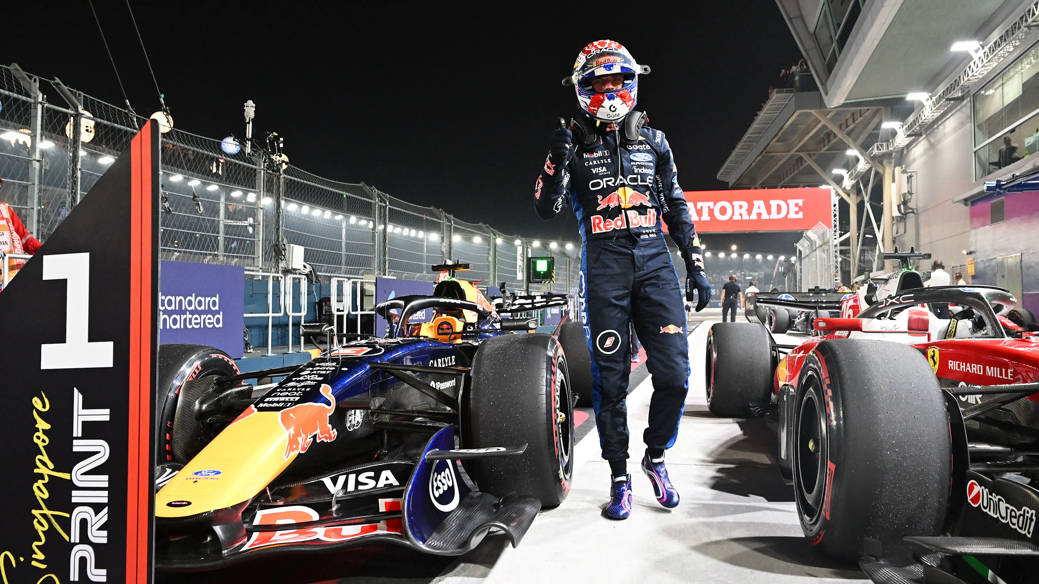 SINGAPORE, SINGAPORE - OCTOBER 09: Sprint Pole qualifier Max Verstappen of the Netherlands and