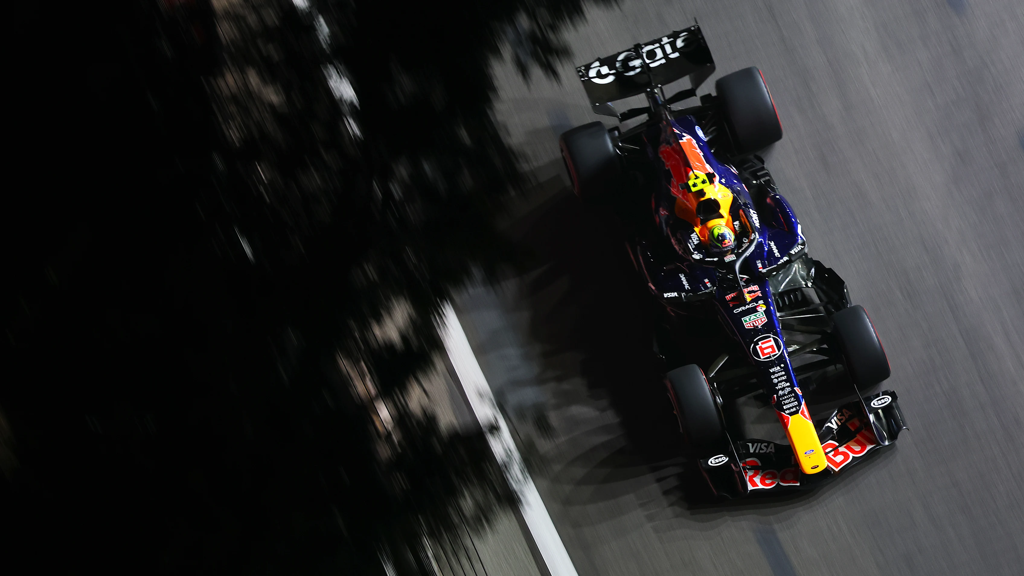 SINGAPORE, SINGAPORE - OCTOBER 09: Isack Hadjar of France driving the (6) Oracle Red Bull Racing