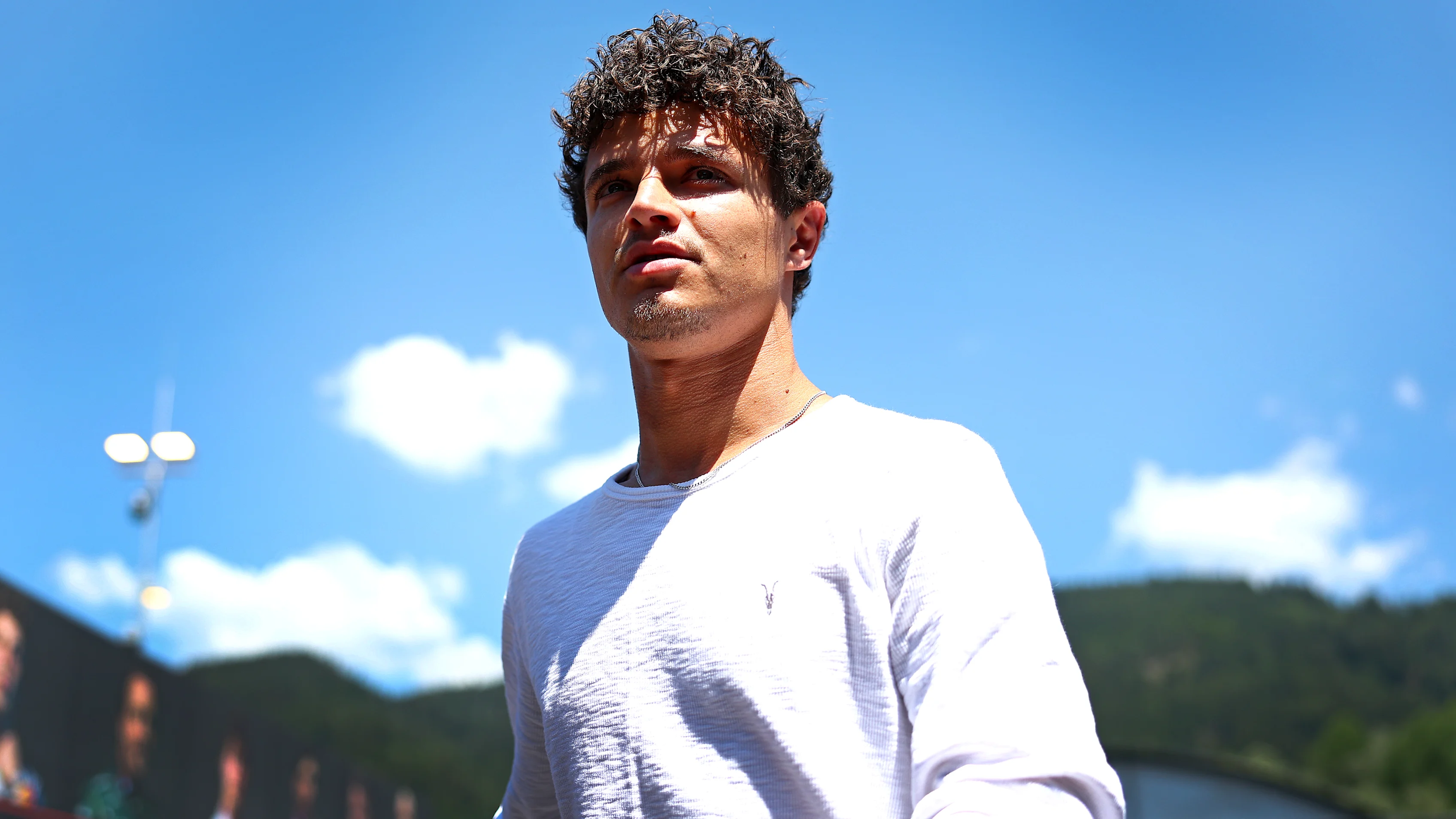 SPIELBERG, AUSTRIA - JUNE 25: Lando Norris of Great Britain and McLaren arrives in the Paddock
