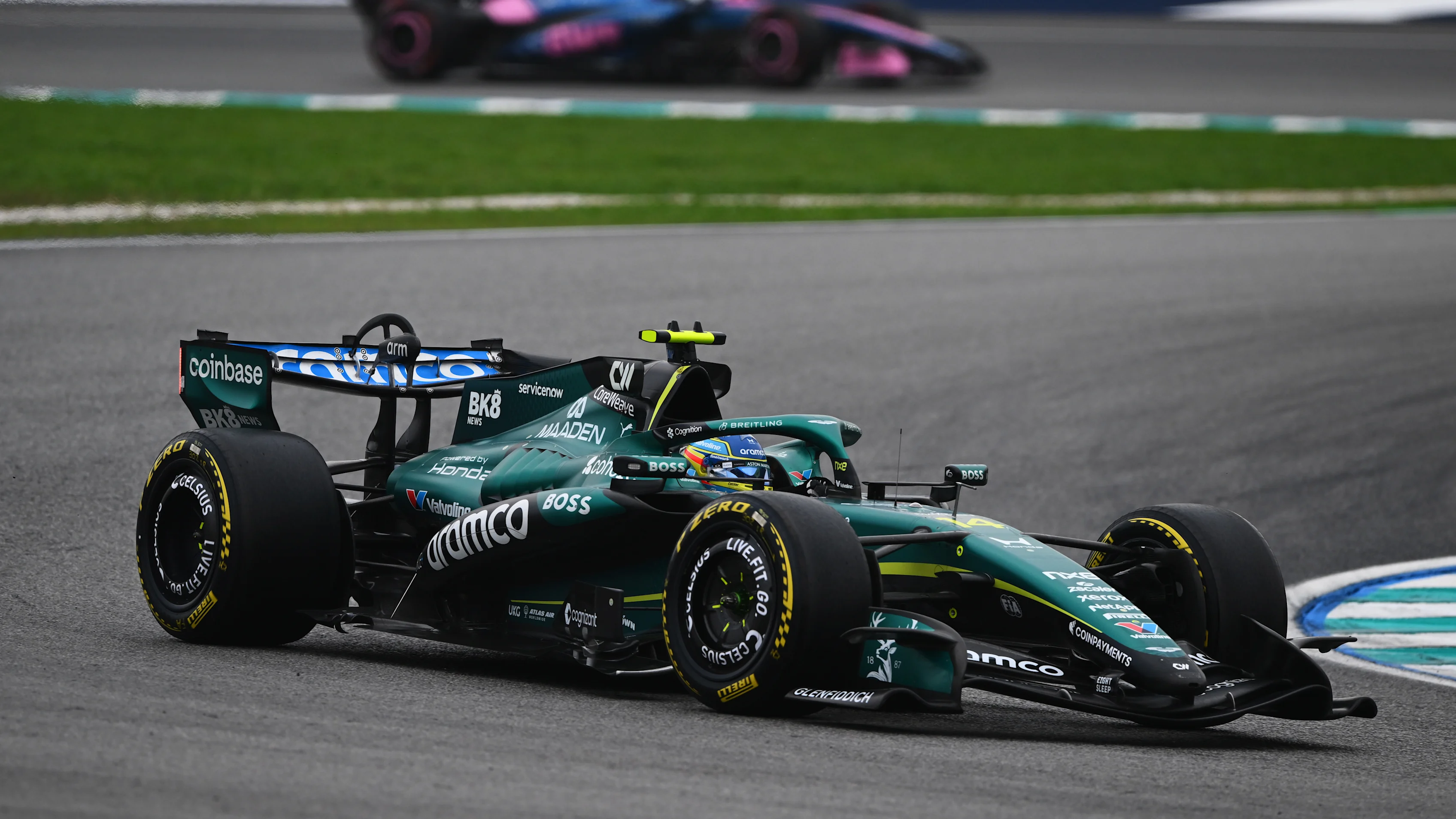 KUALA LUMPUR, MALAYSIA - OCTOBER 04: Fernando Alonso of Spain driving the (14) Aston Martin F1 Team