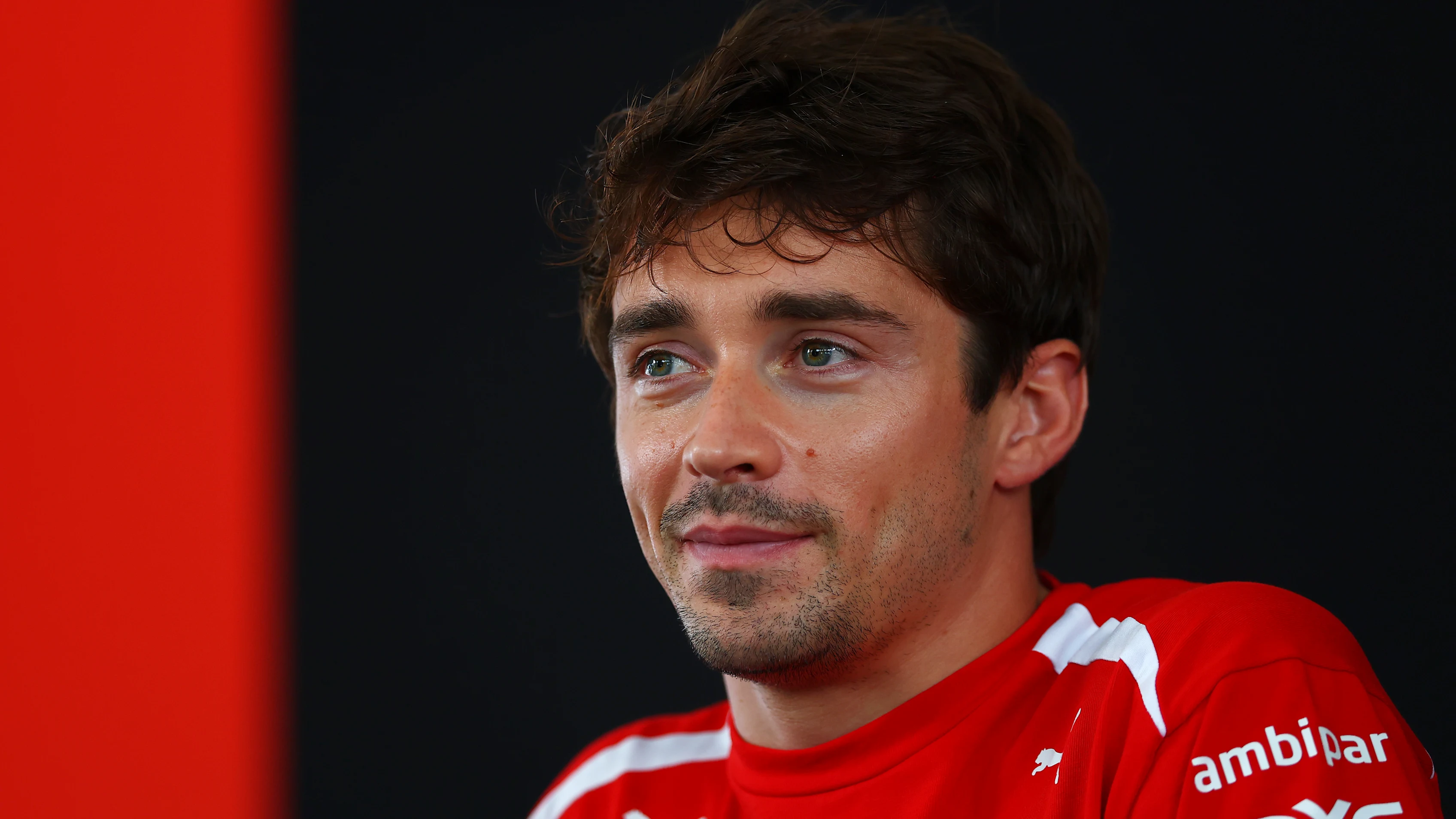 KUALA LUMPUR, MALAYSIA - OCTOBER 01: Charles Leclerc of Monaco and Scuderia Ferrari talks to the