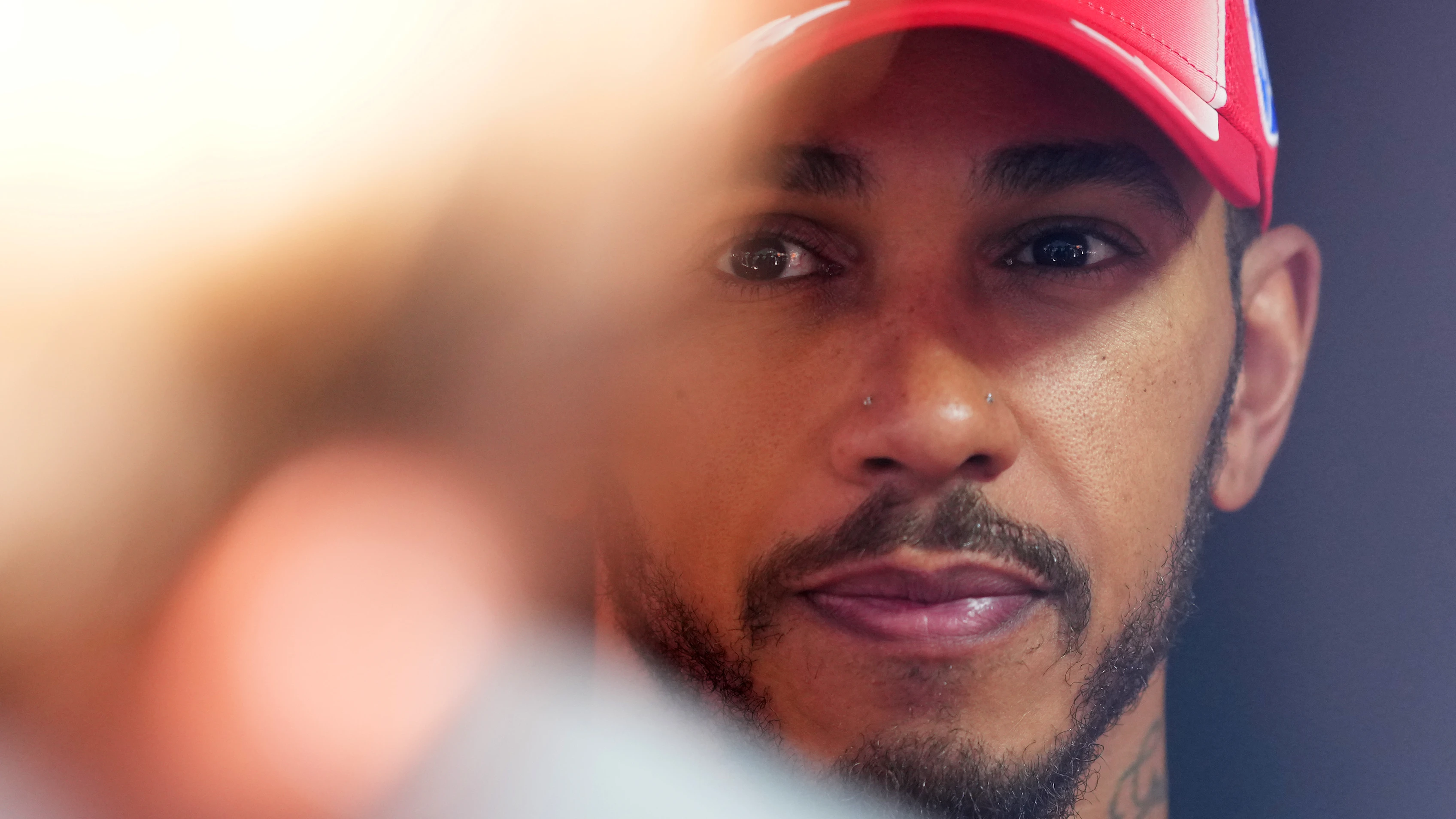 SPA, BELGIUM - JULY 18: Sixth placed qualifier Lewis Hamilton of Great Britain and Scuderia Ferrari