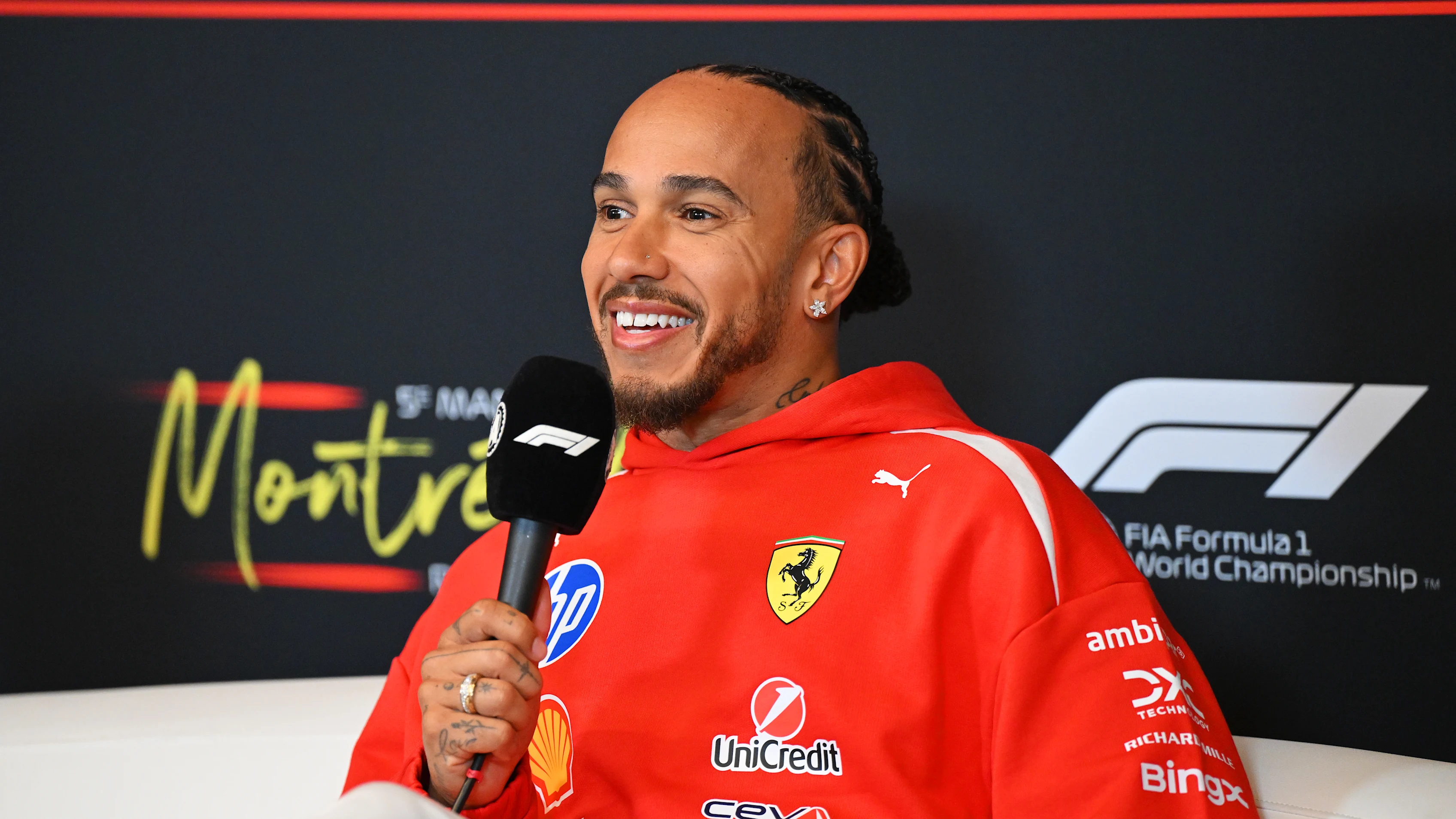 MONTREAL, QUEBEC - MAY 21: Lewis Hamilton of Great Britain and Scuderia Ferrari speaks in the