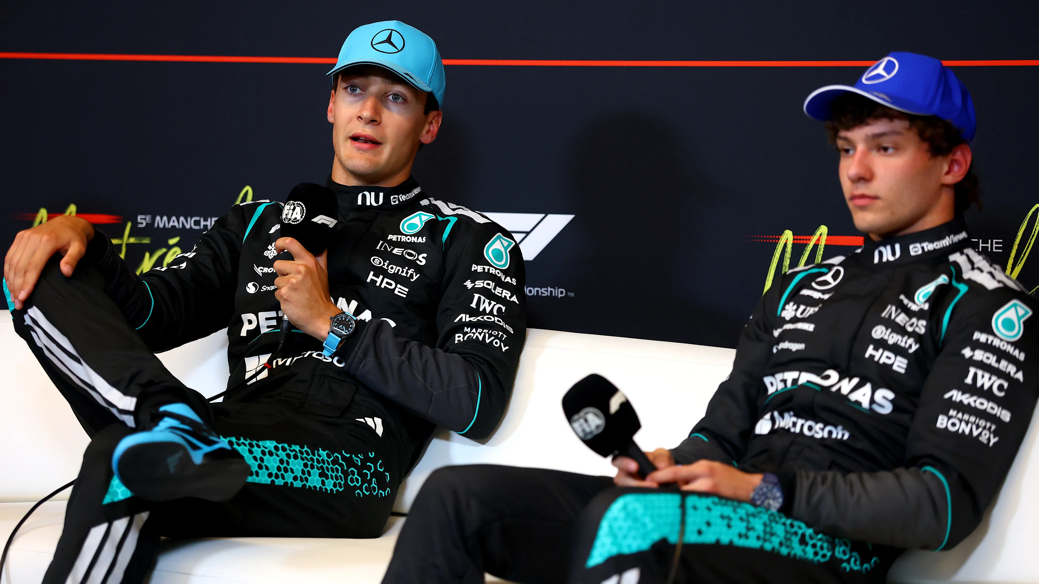 MONTREAL, QUEBEC - MAY 23: Sprint winner George Russell of Great Britain and Mercedes AMG Petronas F1 Team and Third placed Andrea Kimi Antonelli of Italy and Mercedes AMG Petronas F1 Team in the Drivers Press Conference during the Sprint ahead of the F1 Grand Prix of Canada at Circuit Gilles-Villeneuve on May 23, 2026 in Montreal, Quebec. (Photo by Bryn Lennon/Getty Images)