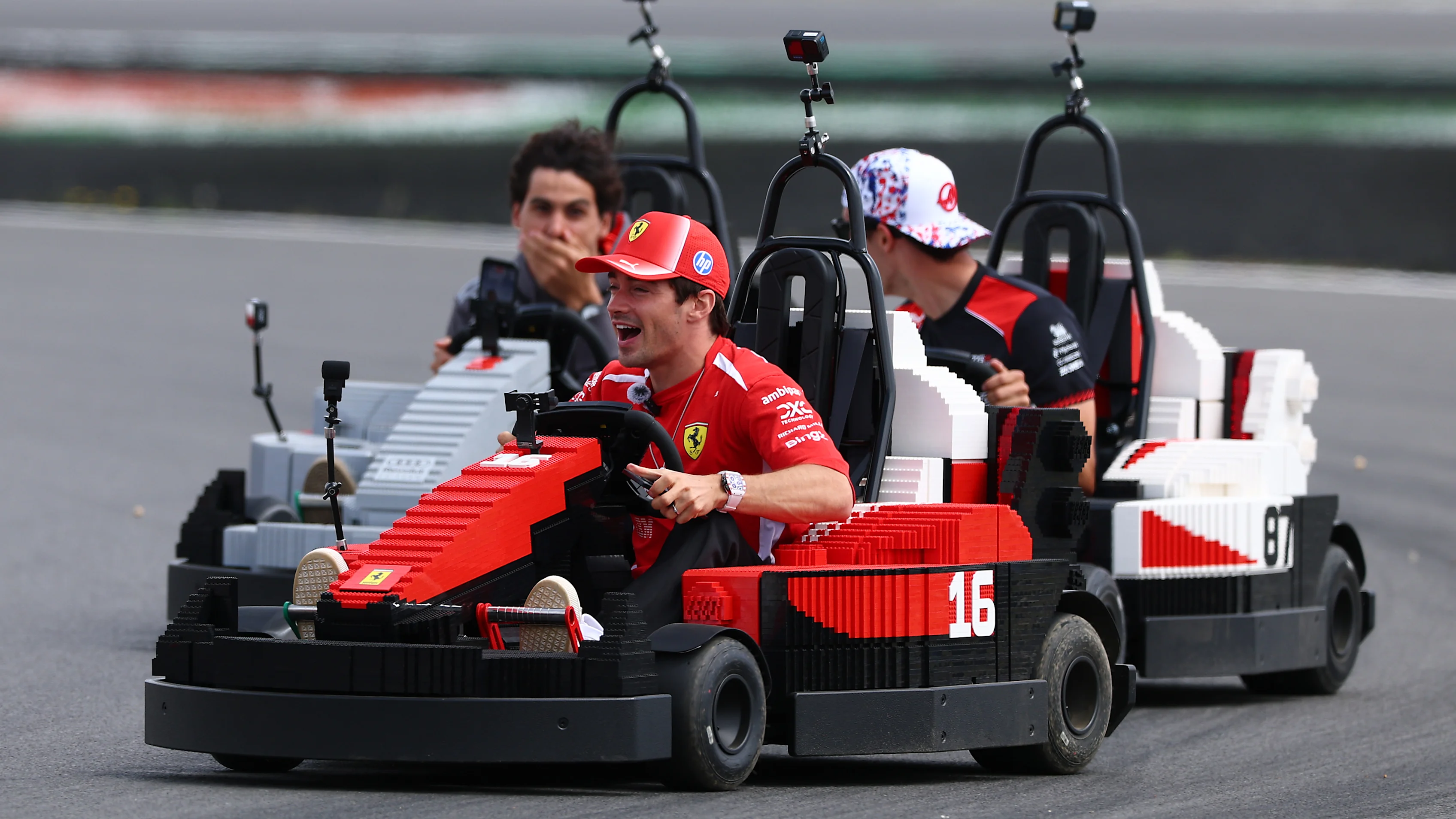 NORTHAMPTON, ENGLAND - JULY 05: Charles Leclerc of Monaco and Scuderia Ferrari Oliver Bearman of