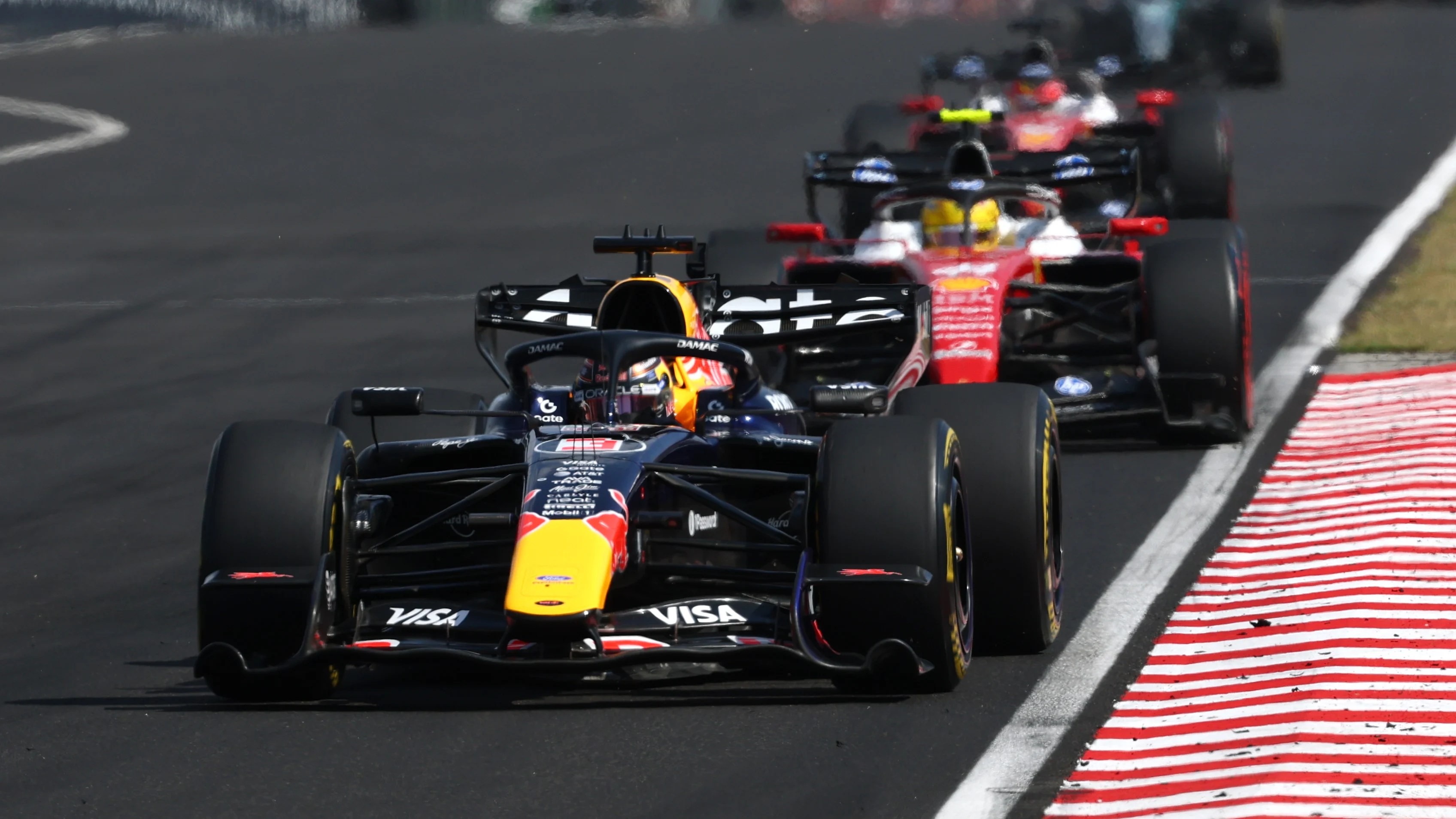 BUDAPEST, HUNGARY - JULY 26: Max Verstappen of the Netherlands driving the (3) Oracle Red Bull