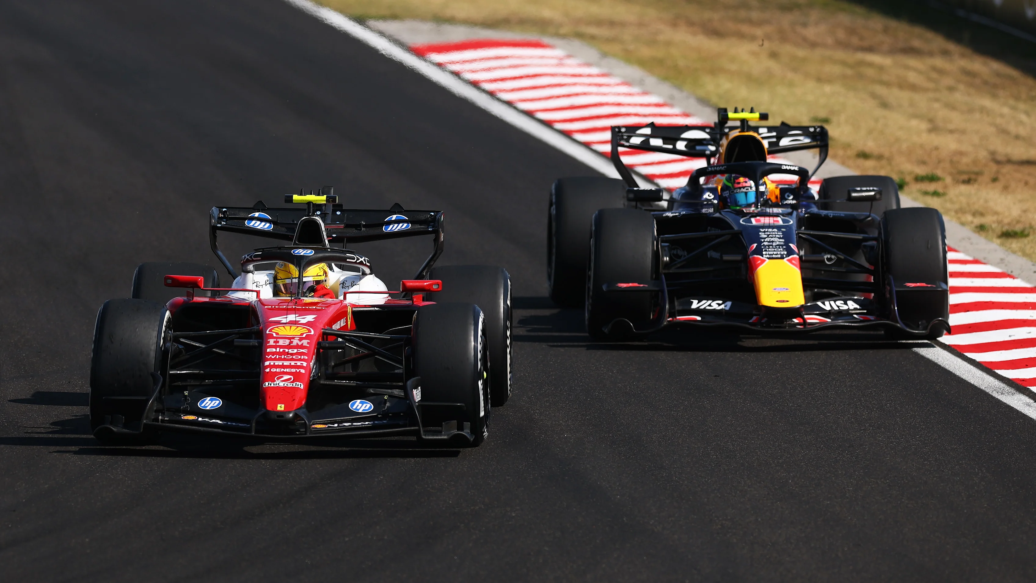 BUDAPEST, HUNGARY - JULY 26: Lewis Hamilton of Great Britain driving the (44) Scuderia Ferrari