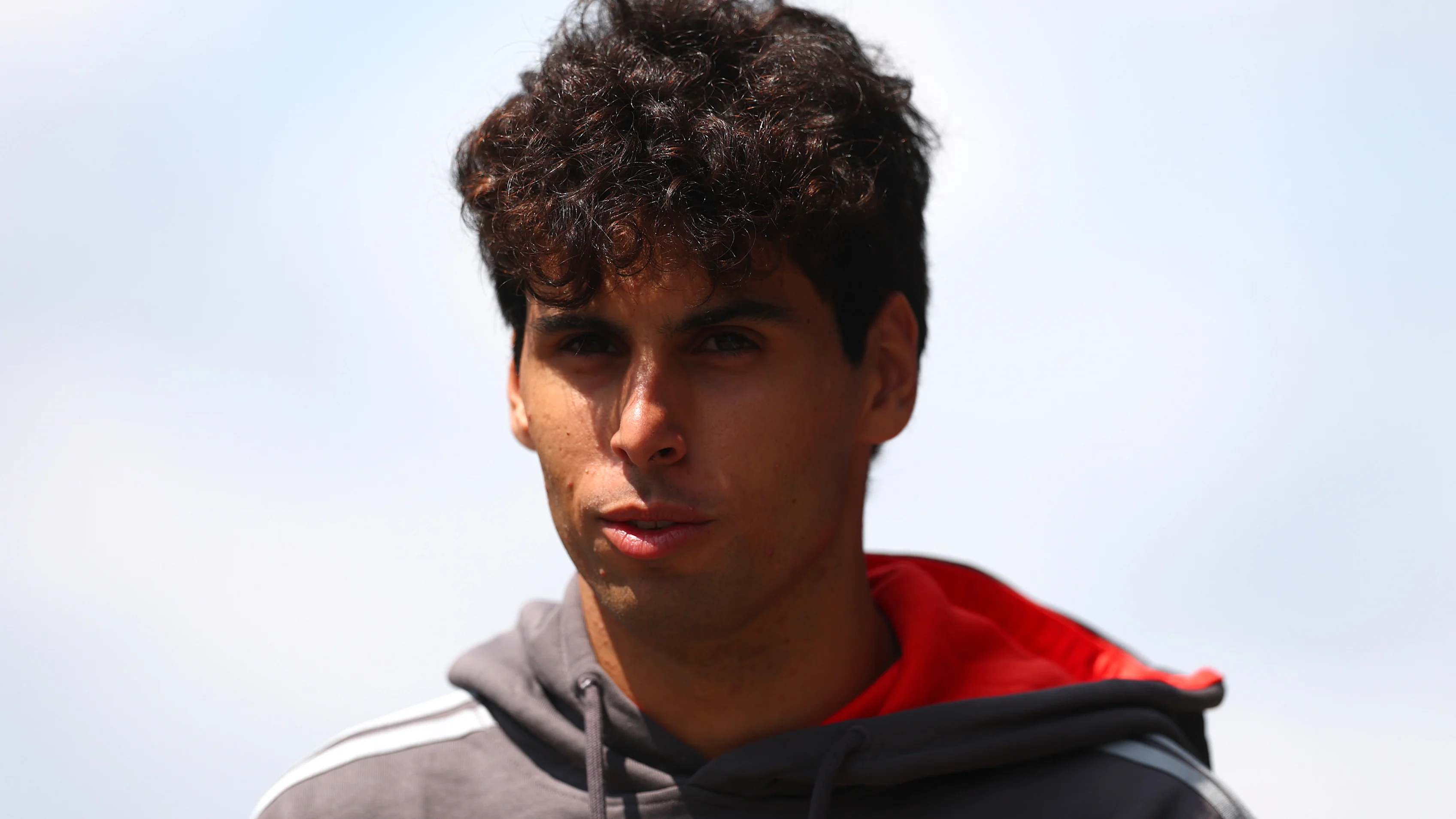 BUDAPEST, HUNGARY - JULY 23: Gabriel Bortoleto of Brazil and Audi F1 Team walks in the Paddock