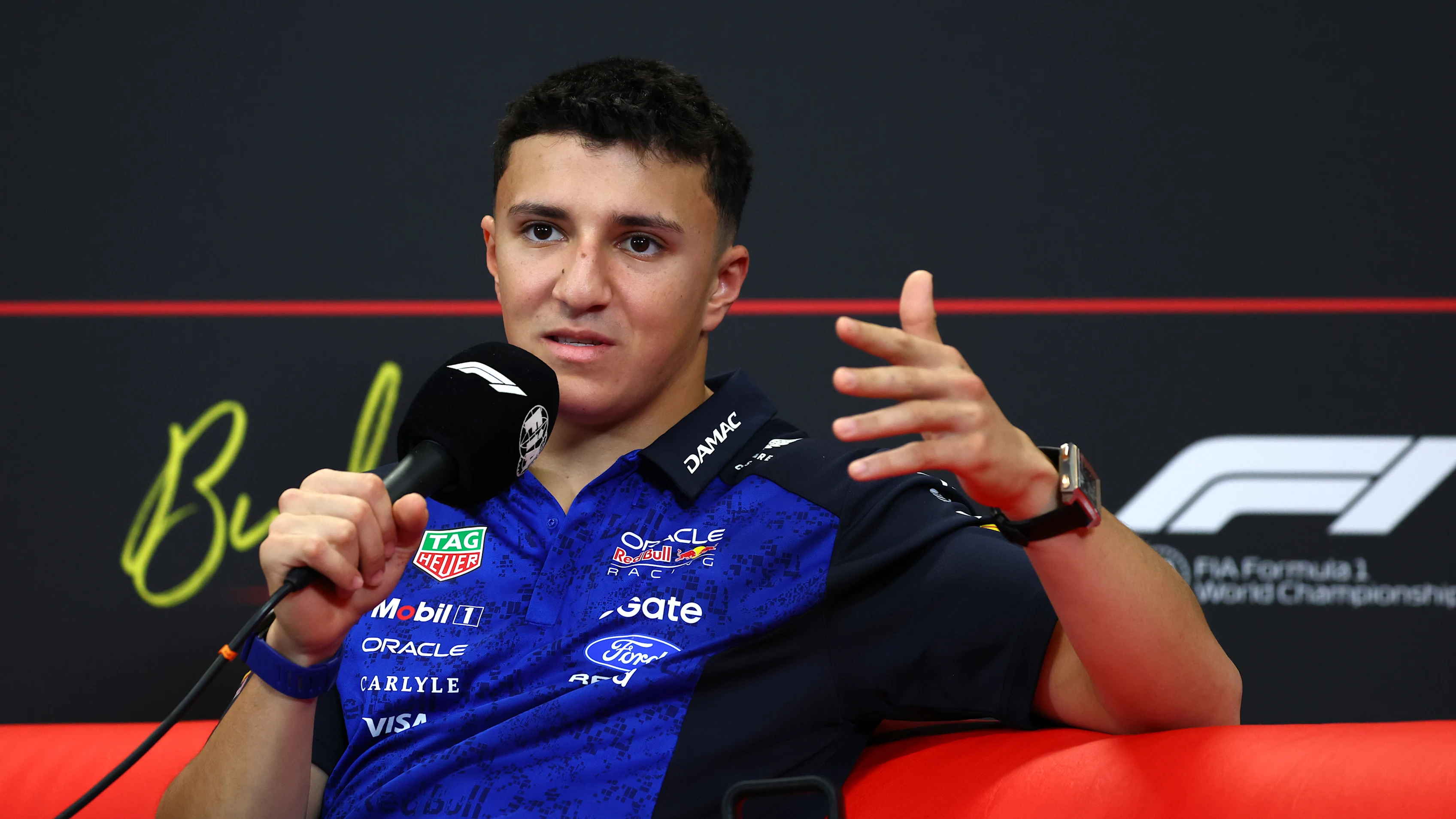 BUDAPEST, HUNGARY - JULY 23: Isack Hadjar of France and Oracle Red Bull Racing speaks in the