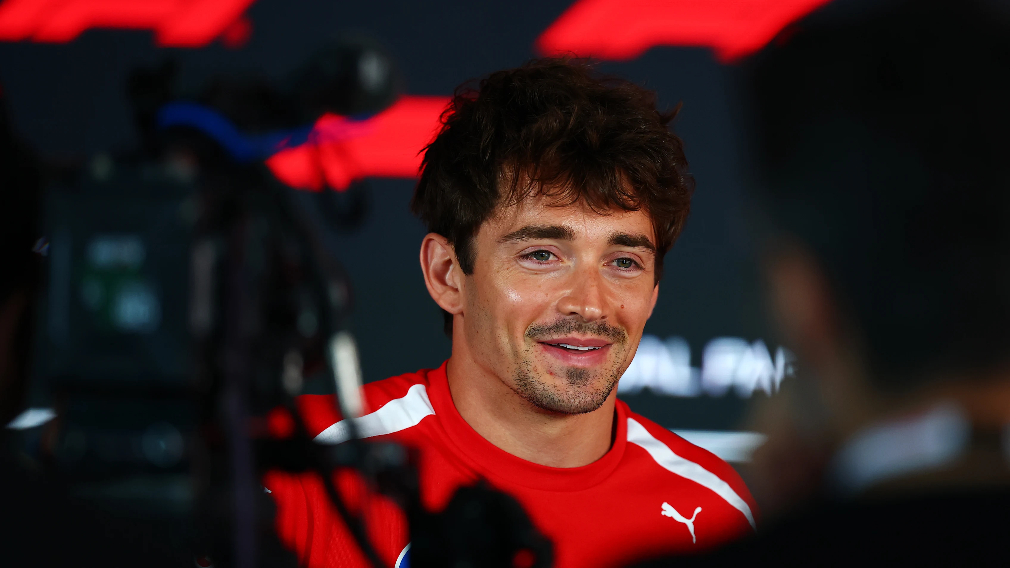 BUDAPEST, HUNGARY - JULY 23: Charles Leclerc of Monaco and Scuderia Ferrari talks to the media