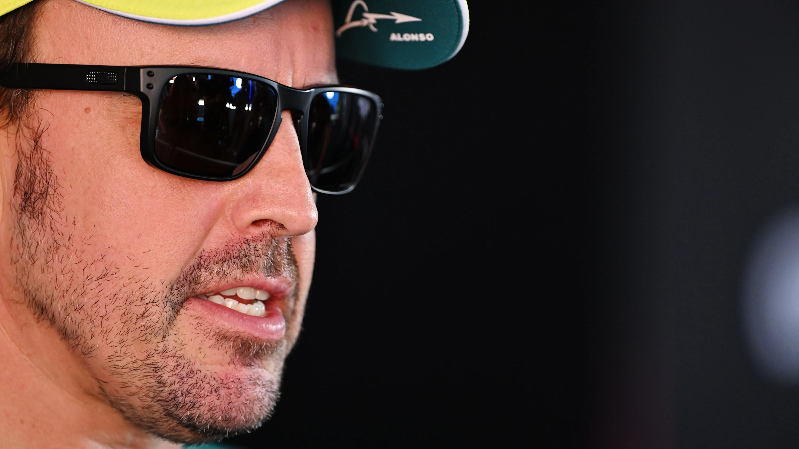 MONZA, ITALY - SEPTEMBER 03: Fernando Alonso of Spain and Aston Martin F1 Team talks to the media